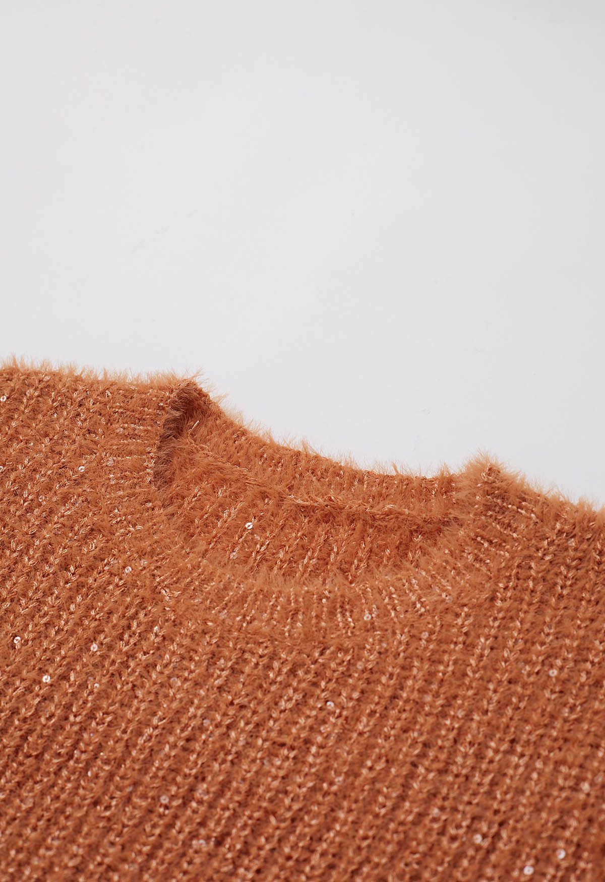 Suéter de manga corta con lentejuelas en naranja