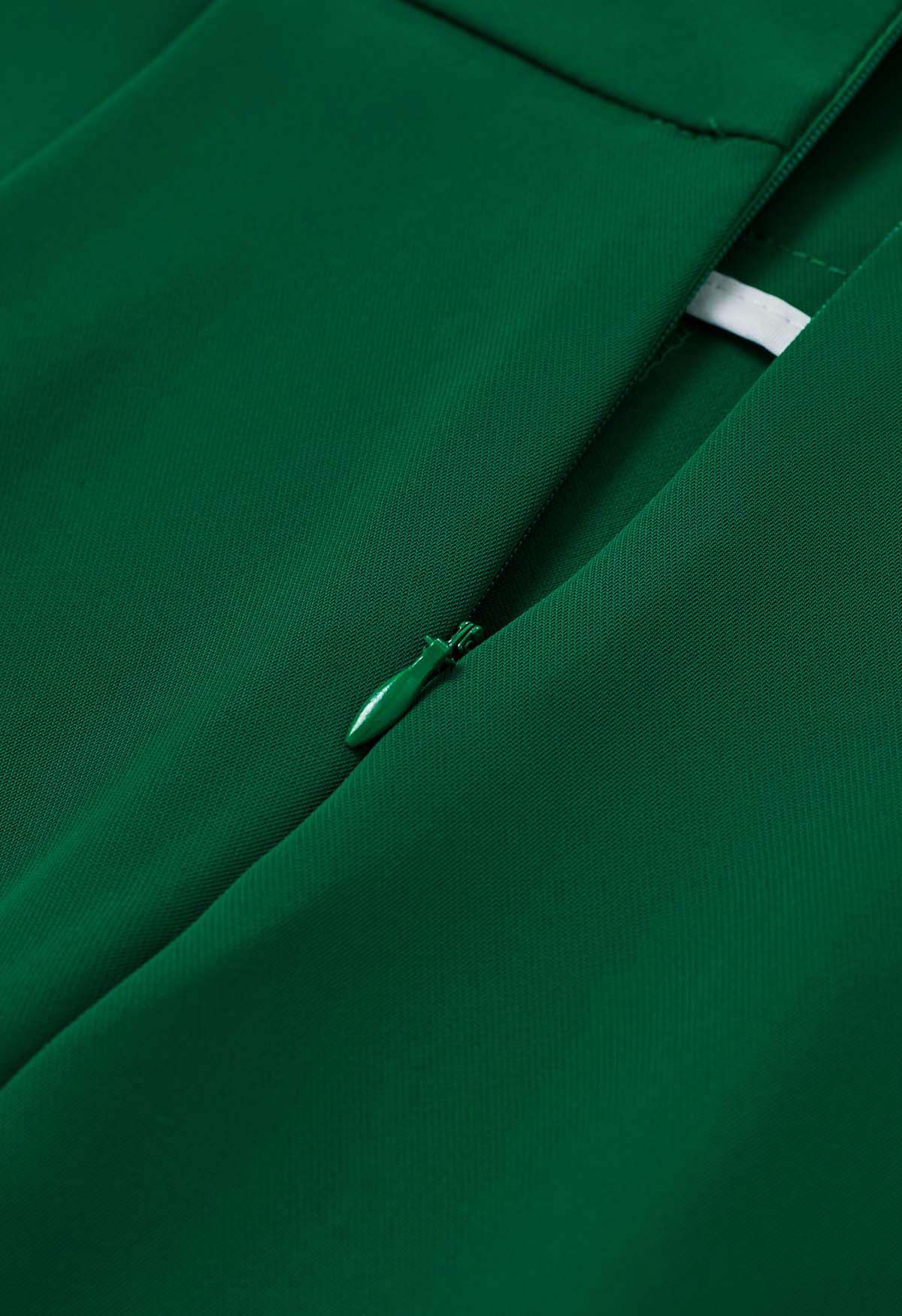 Pantalones rectos con cintura plisada en verde