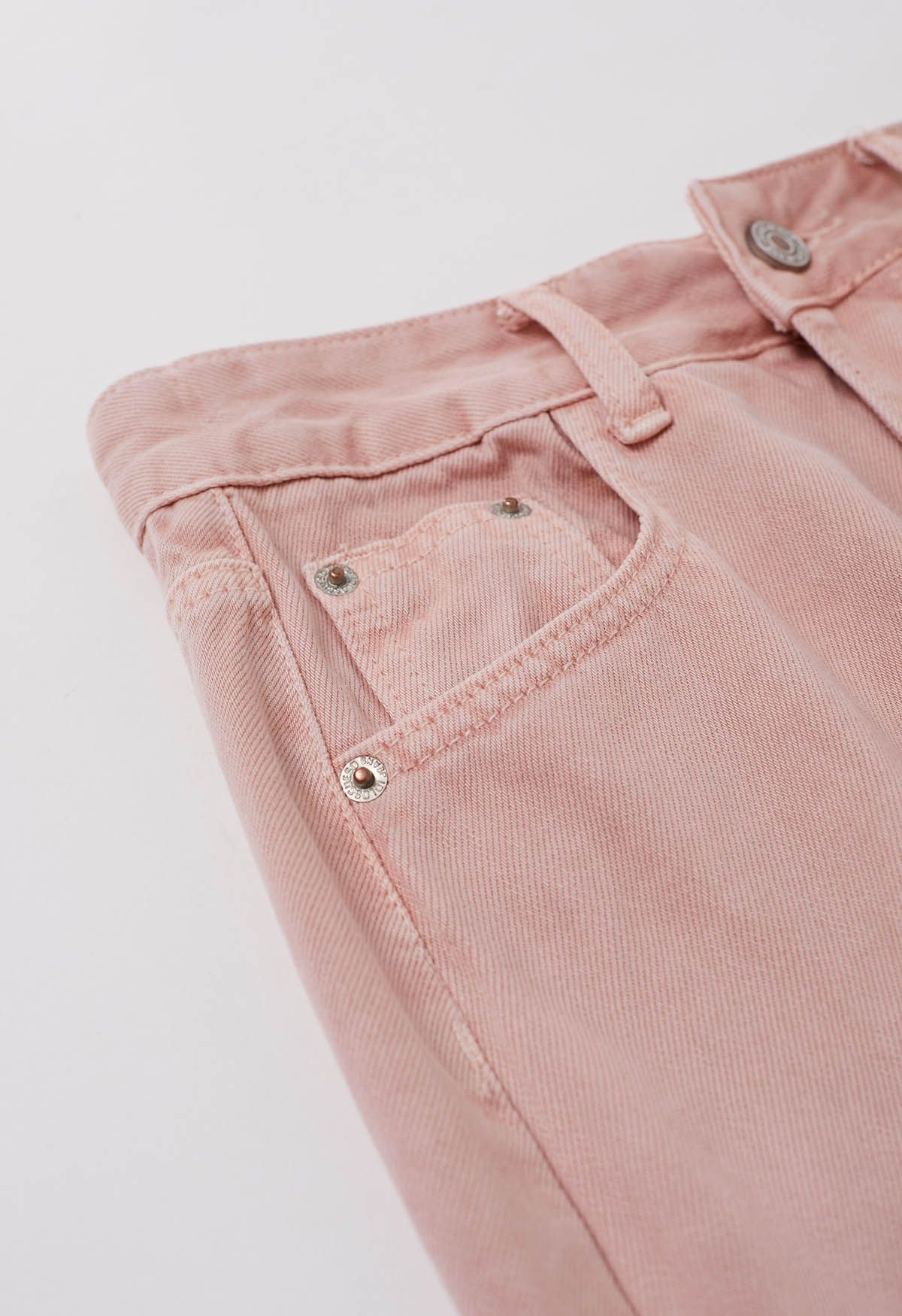 Falda larga vaquera con cinturón y abertura en la espalda en rosa