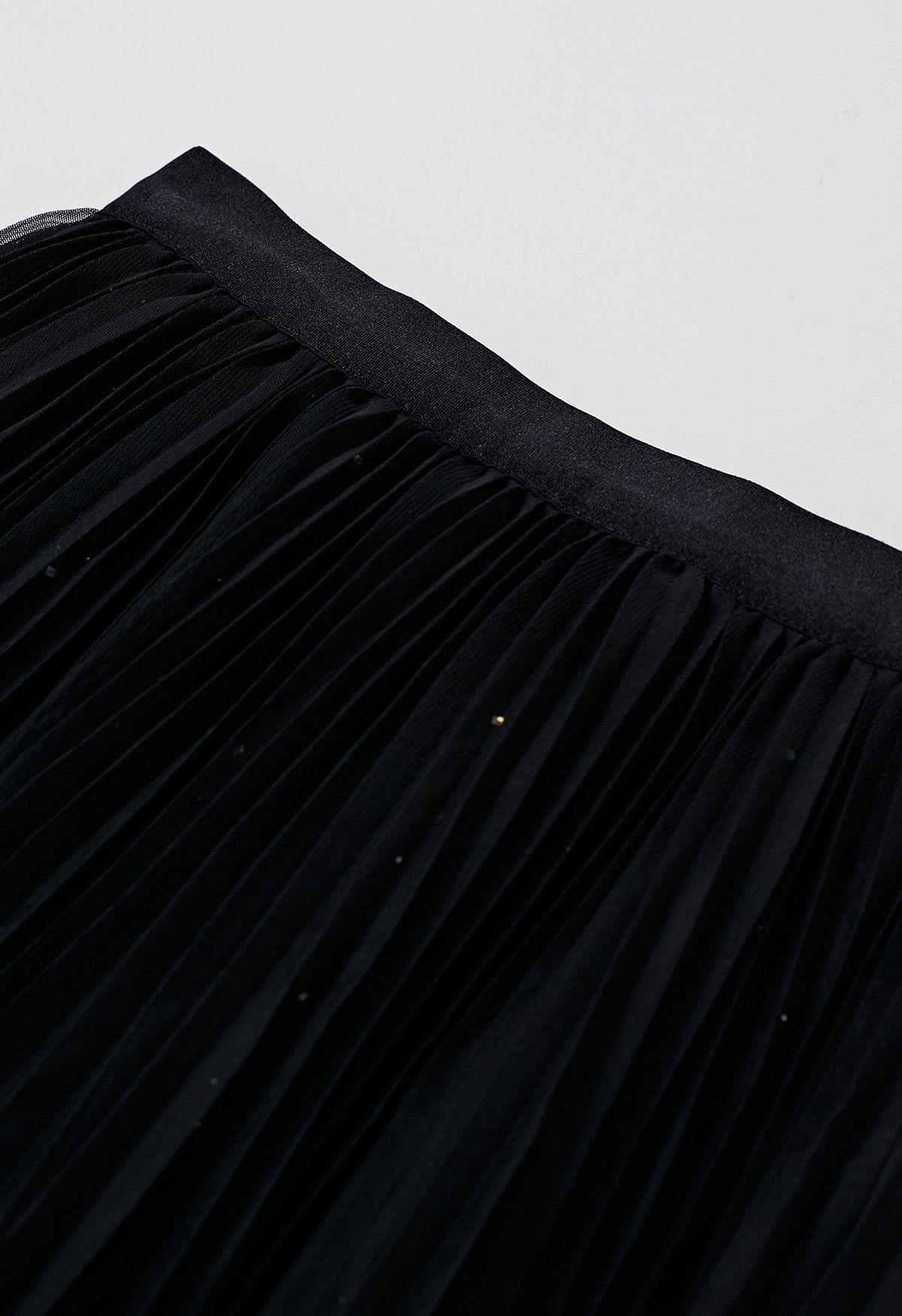 Falda de tul de malla plisada con ribete de purpurina en negro