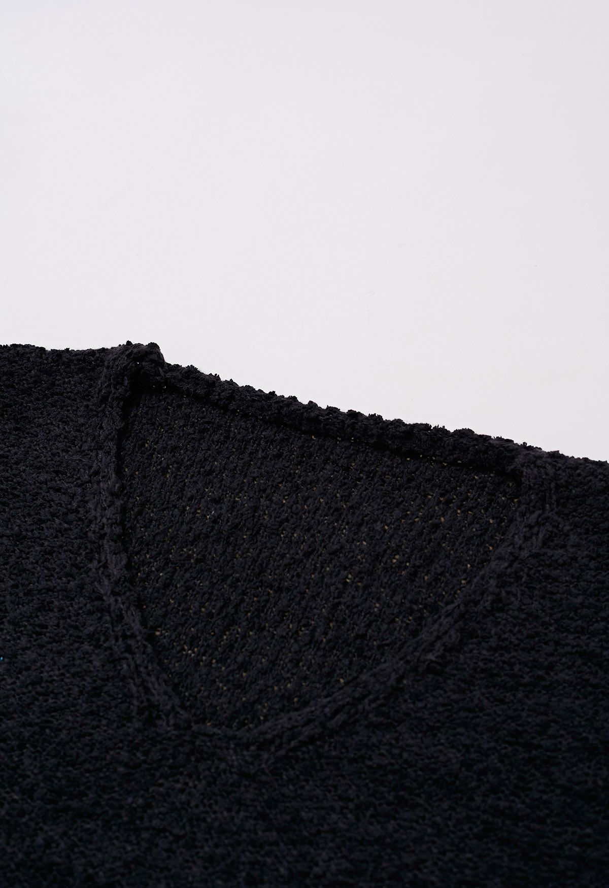 Suéter de punto cómodo con cuello en V en negro