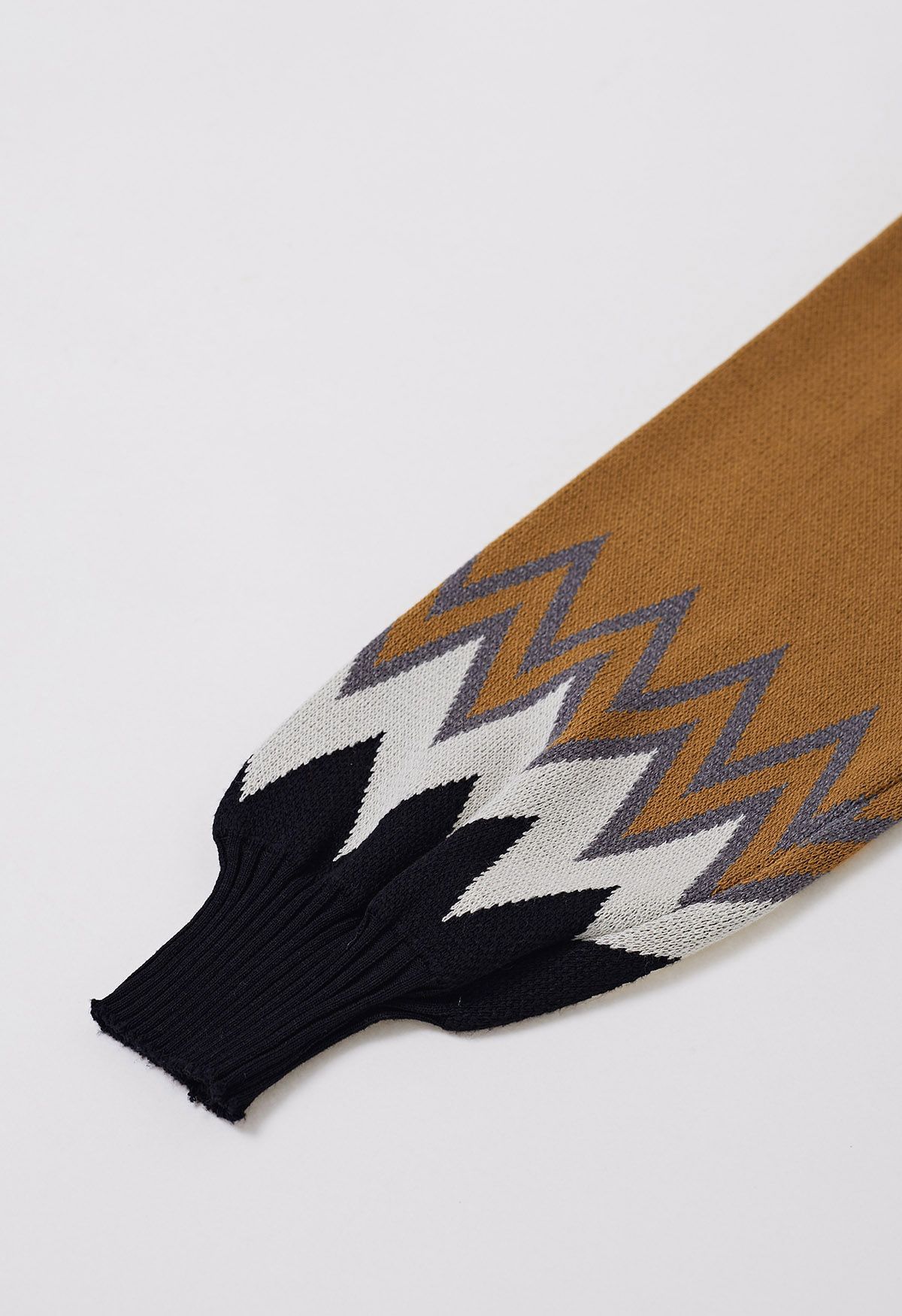 Suéter de punto en zigzag con bloques de color