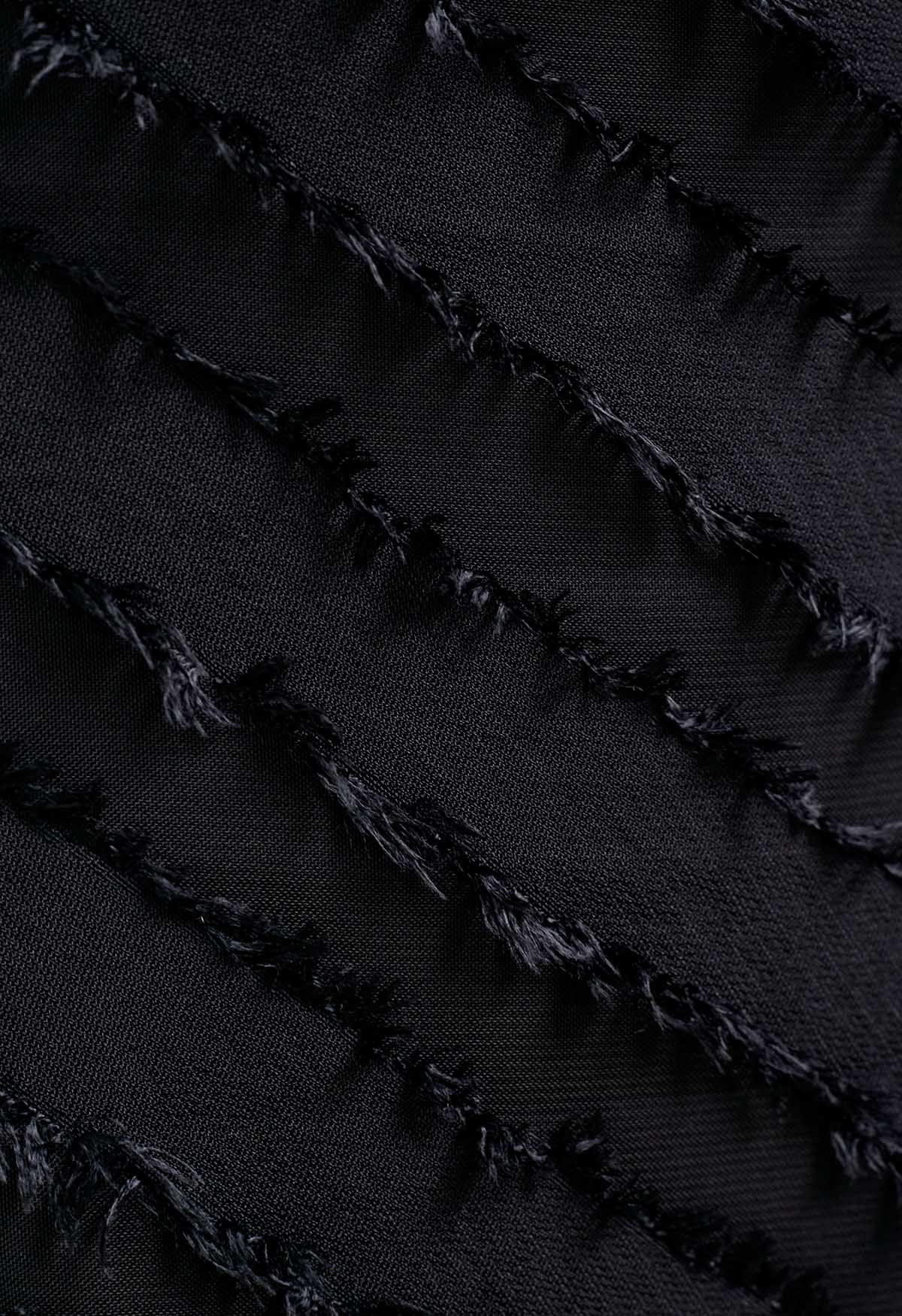 Vestido camisola con abertura y rayas con flecos en negro