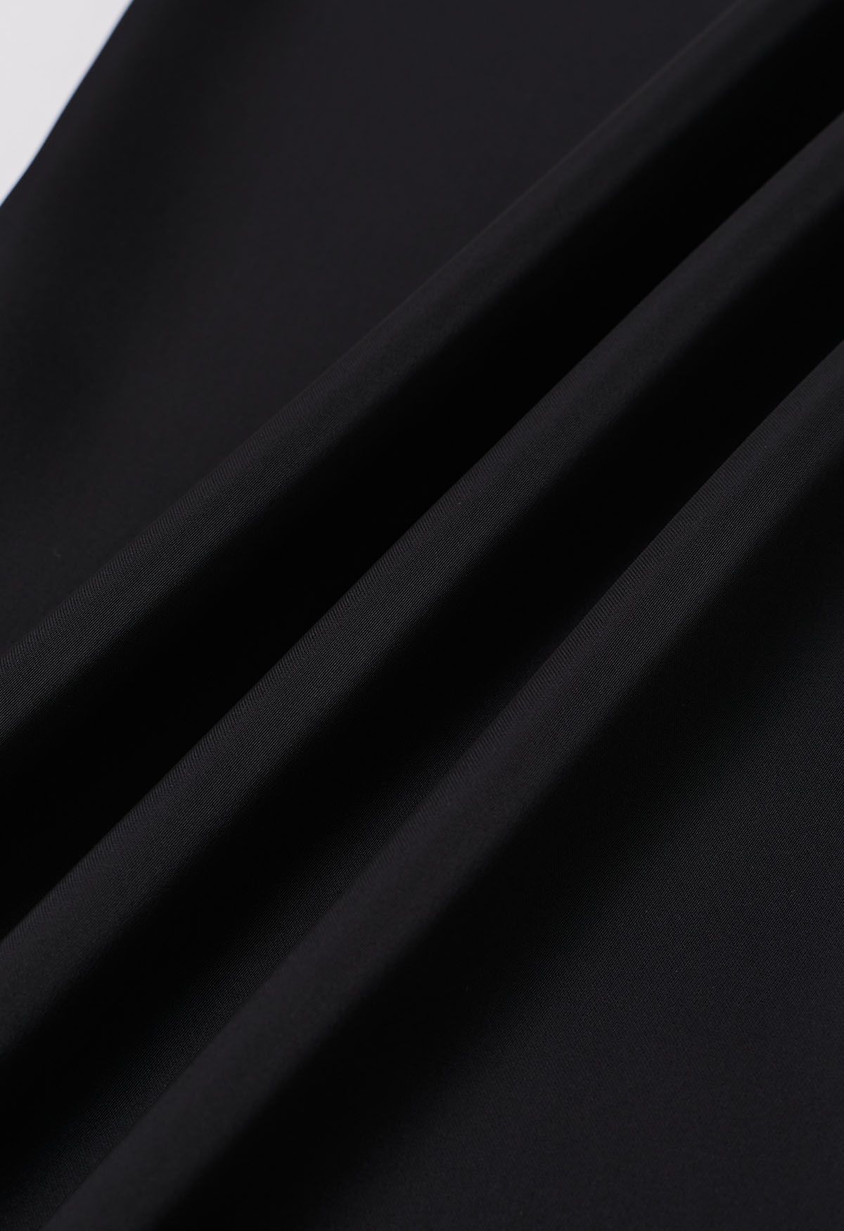 Pantalones sin cordones con acabado satinado en negro