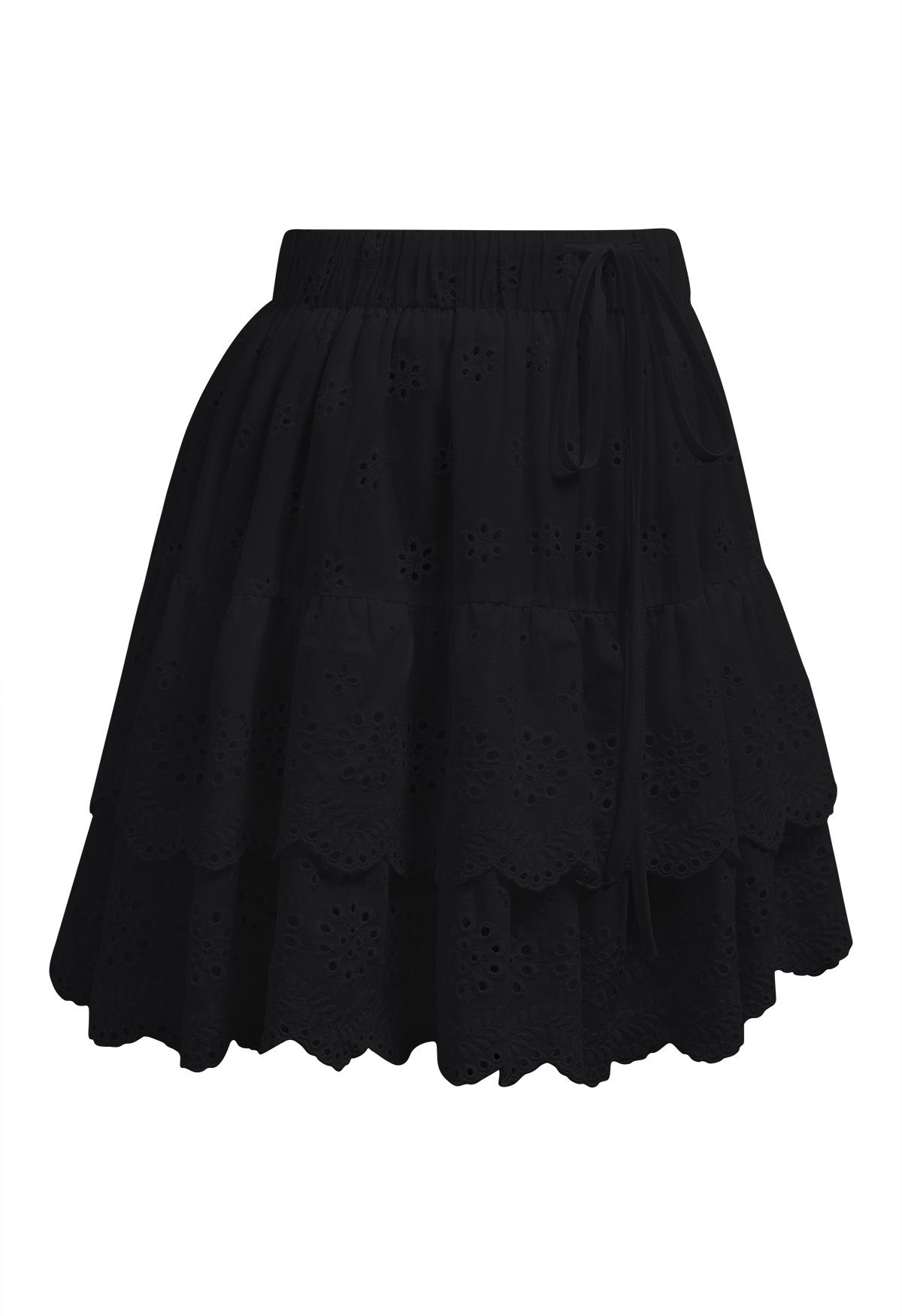 Minifalda escalonada con bordado de ojales en negro