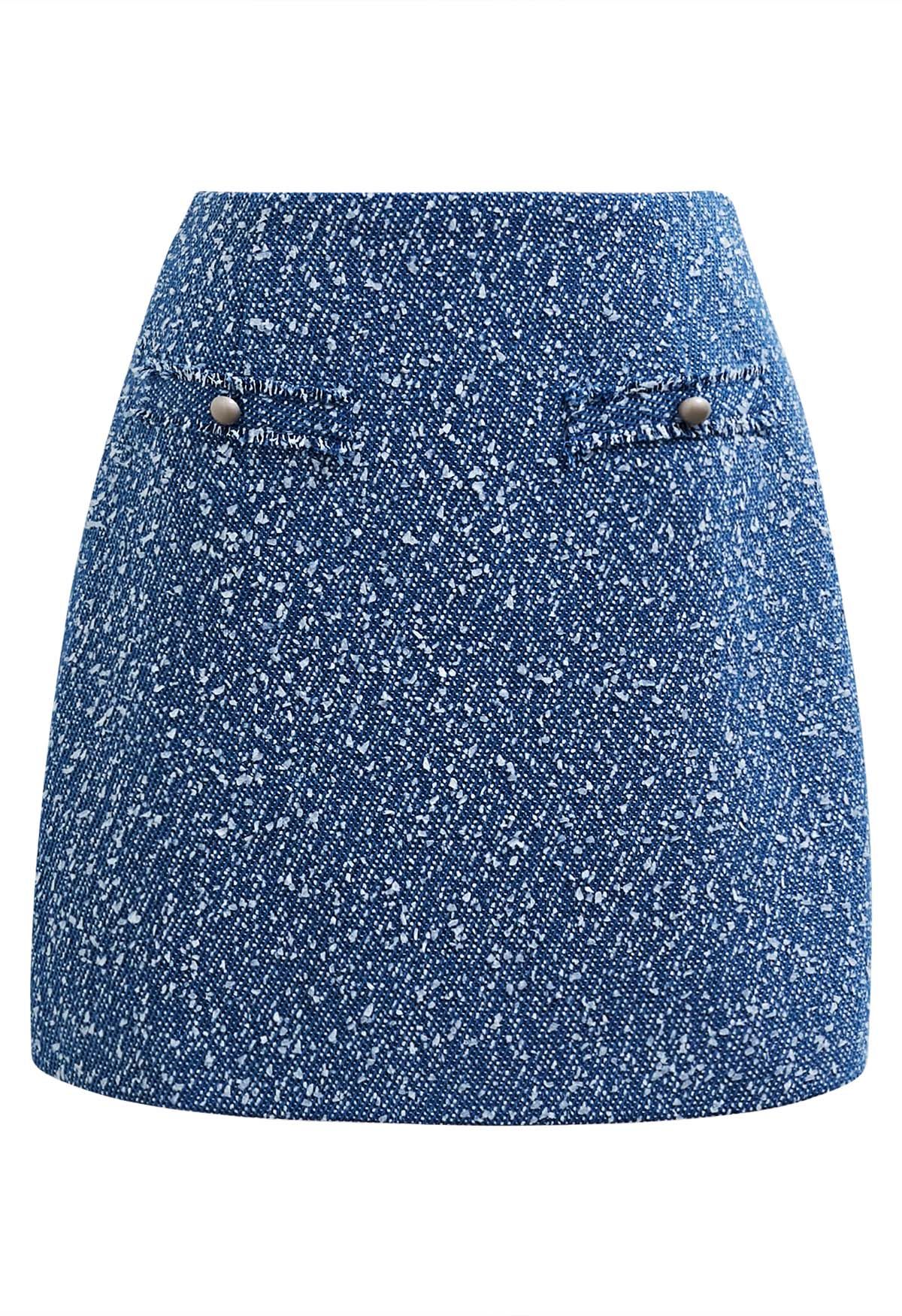 Minifalda de tweed con botones de varios colores en azul