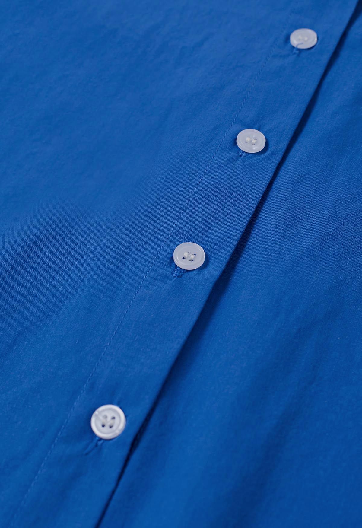 Camisa corta elegante con botones en azul