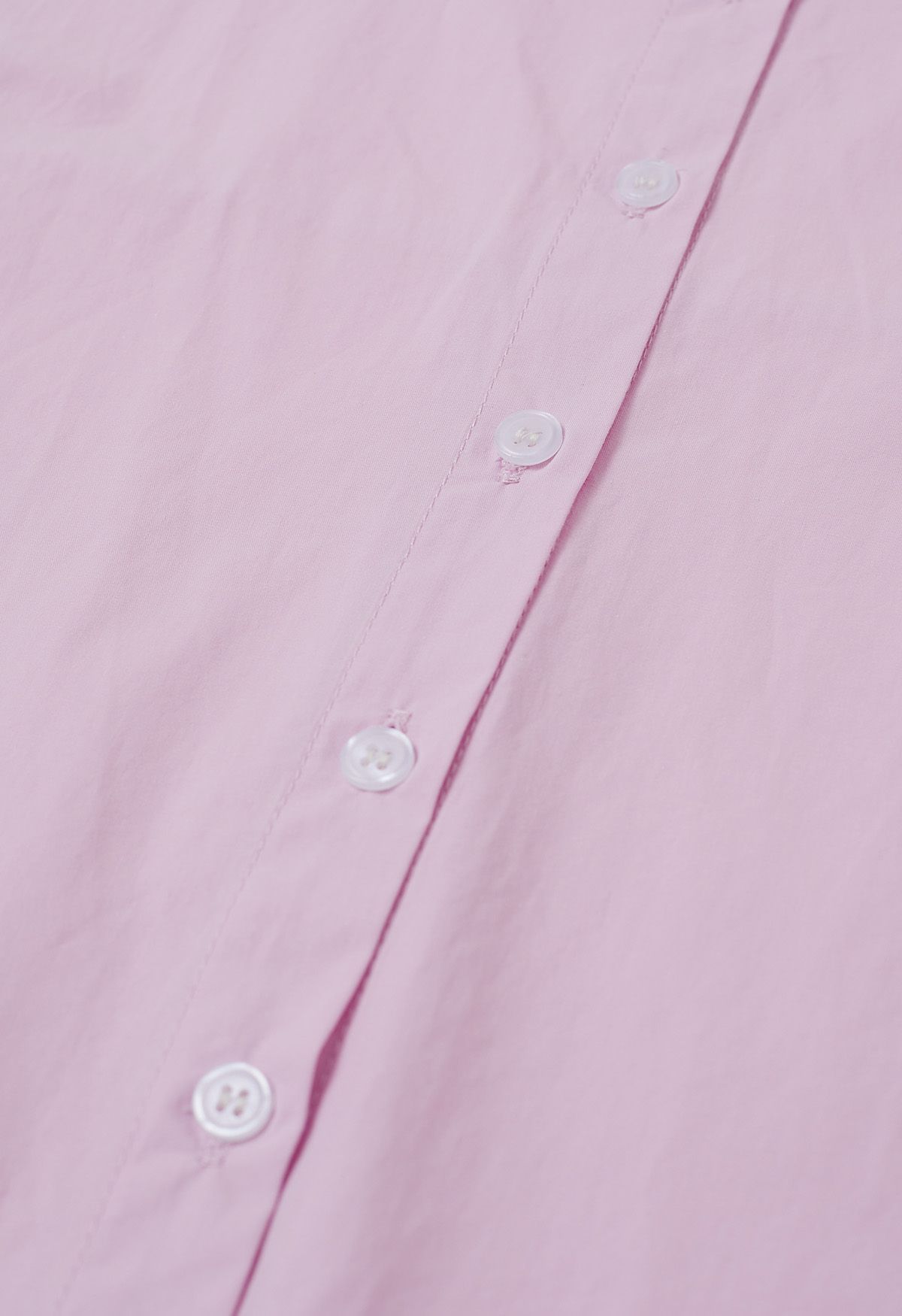 Camisa corta elegante con botones en rosa