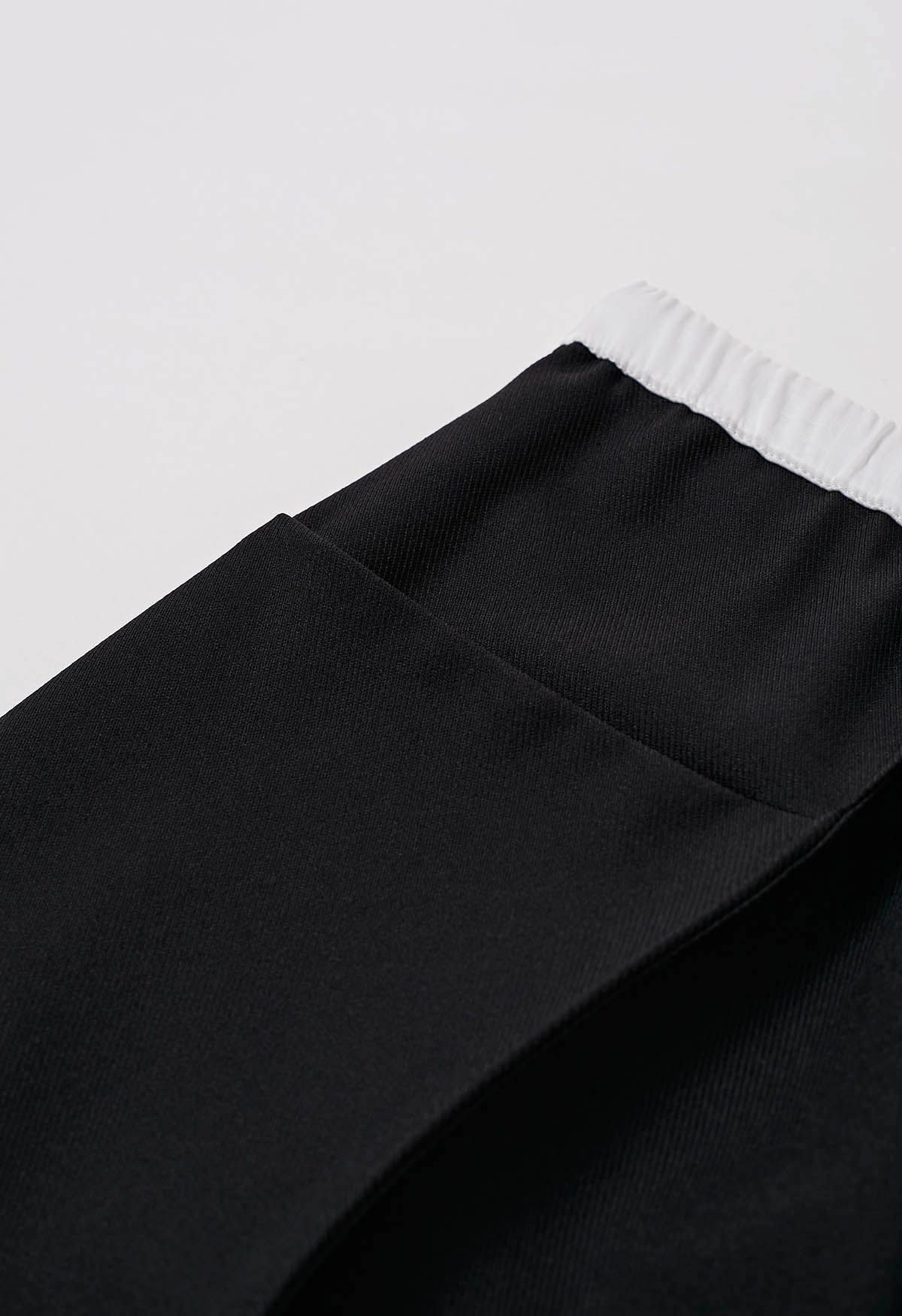 Pantalones rectos con detalle de costura en la cintura en contraste en negro