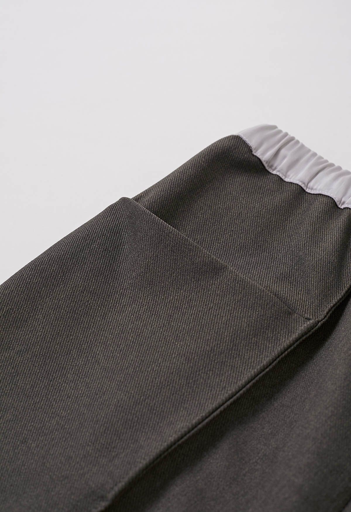 Pantalones rectos con detalle de costura en la cintura en contraste en color topo