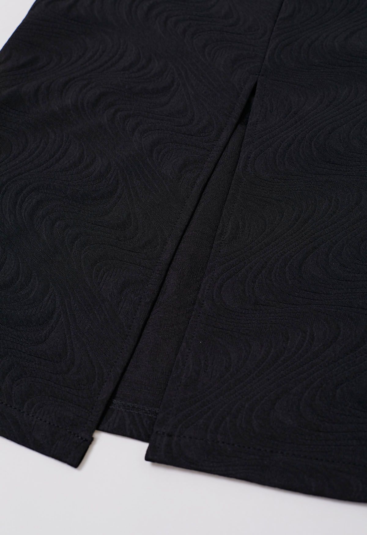 Falda larga de tubo de jacquard ondulado en negro