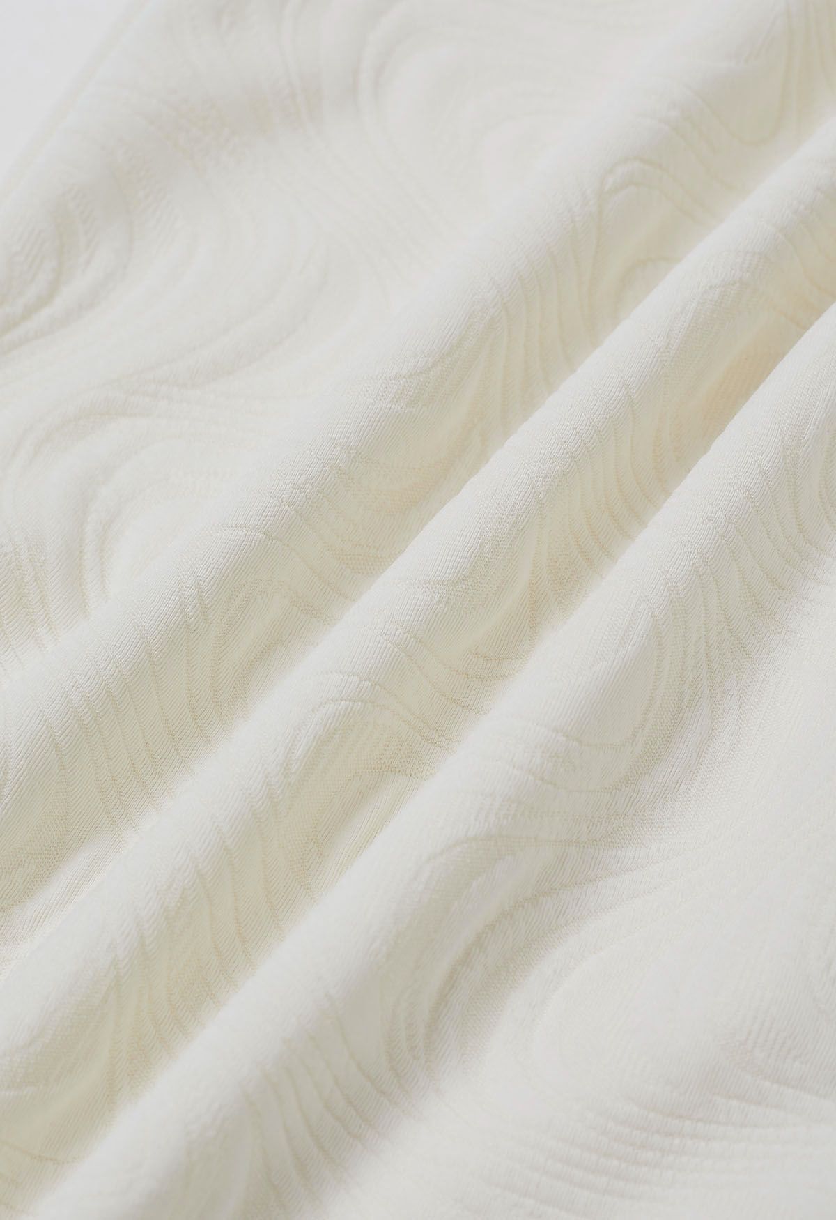 Falda larga de tubo de jacquard ondulado en marfil
