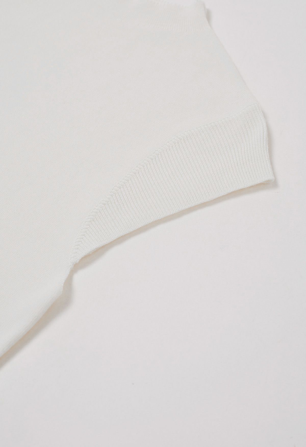Top de punto con cuello simulado y cintura con cordón en la espalda en blanco