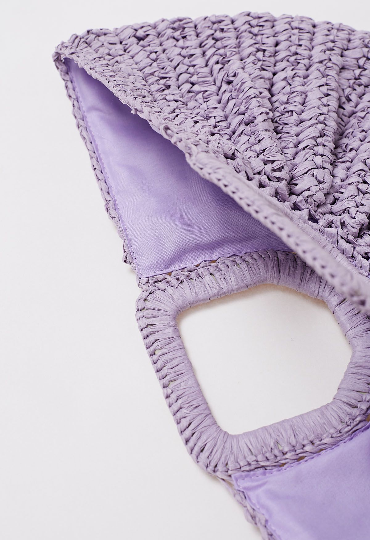 Bolso de mano de paja tejido semicírculo en color lila