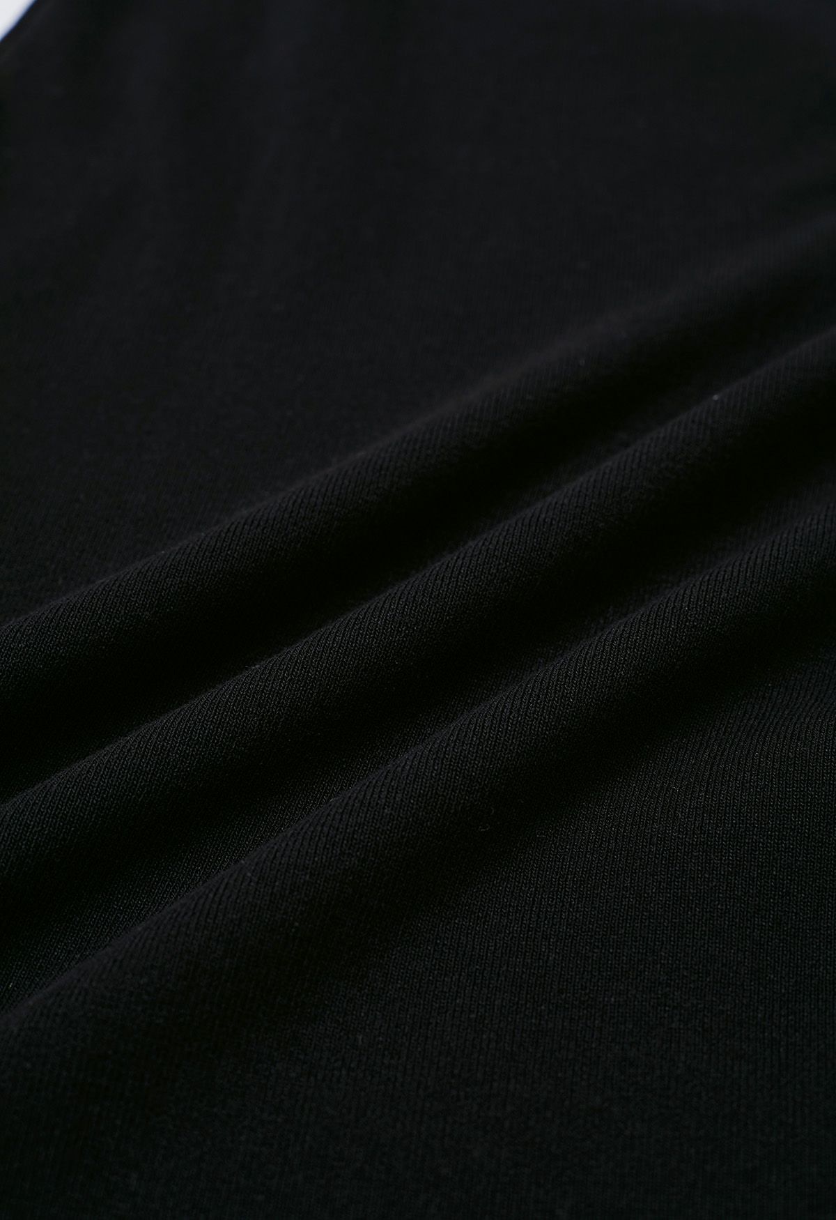 Vestido ajustado de punto con escote con lazo lateral en negro