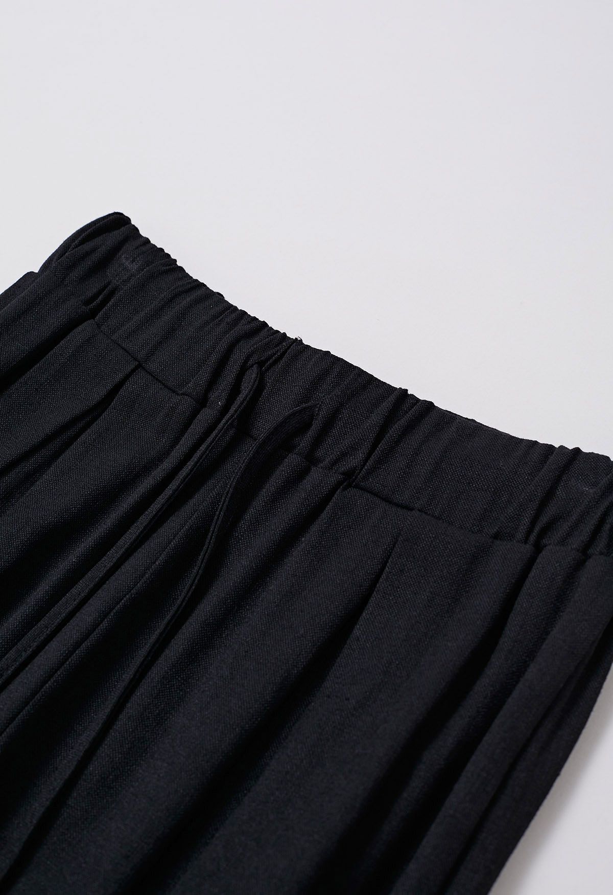 Pantalones plisados de mezcla de lino Casual Season en negro