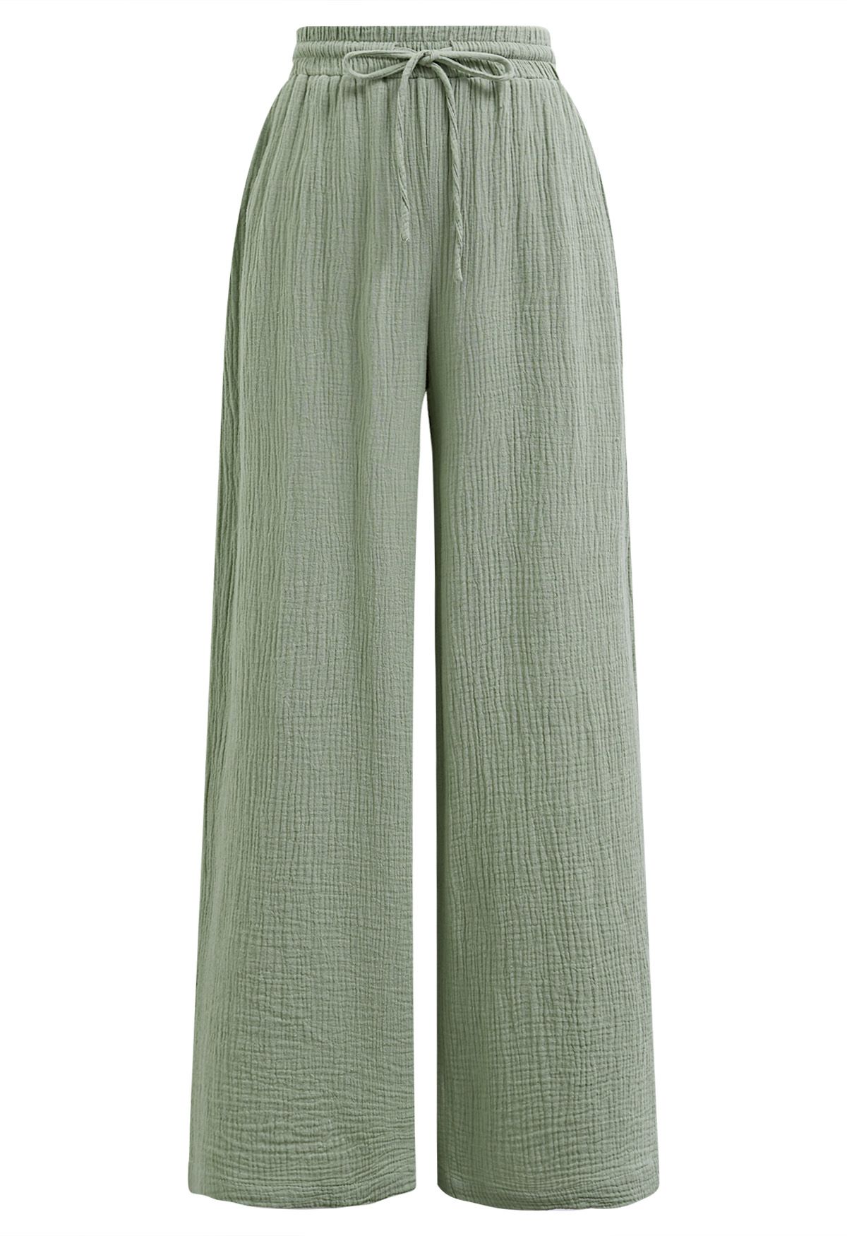 Pantalones ligeros de algodón con cordón en verde guisante