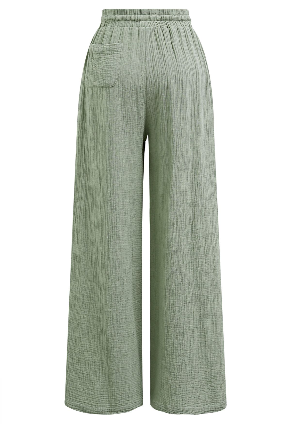 Pantalones ligeros de algodón con cordón en verde guisante