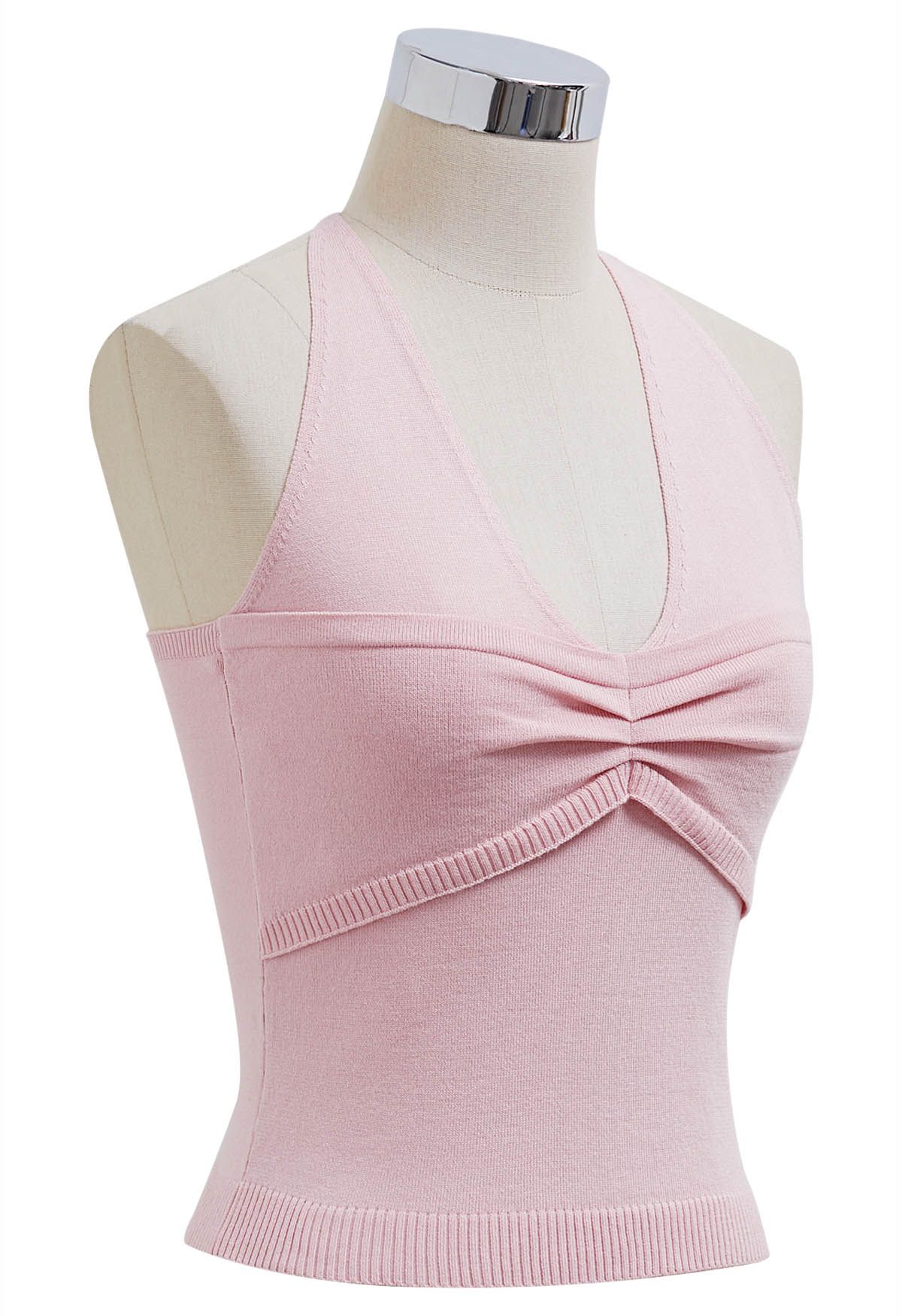 Top de punto con escote halter y detalle de pinzas en rosa