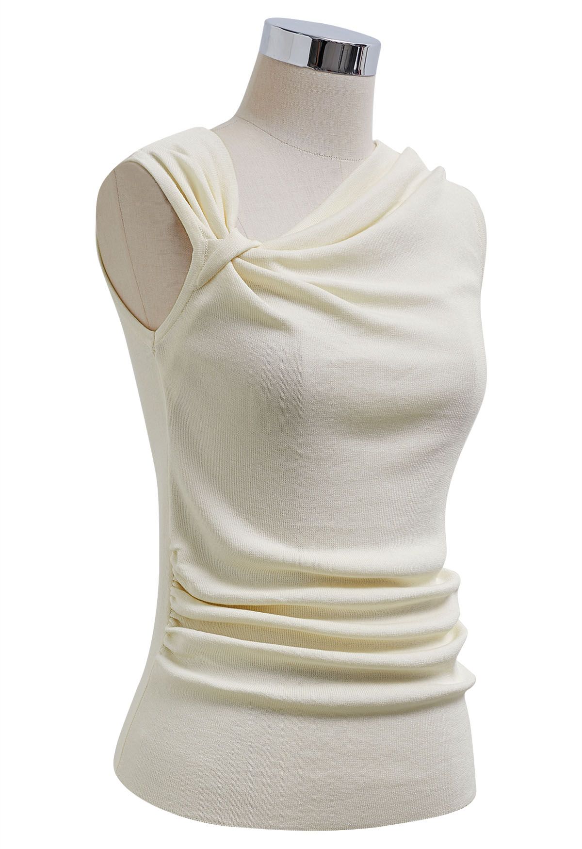 Top de punto sin mangas con nudo lateral en color crema