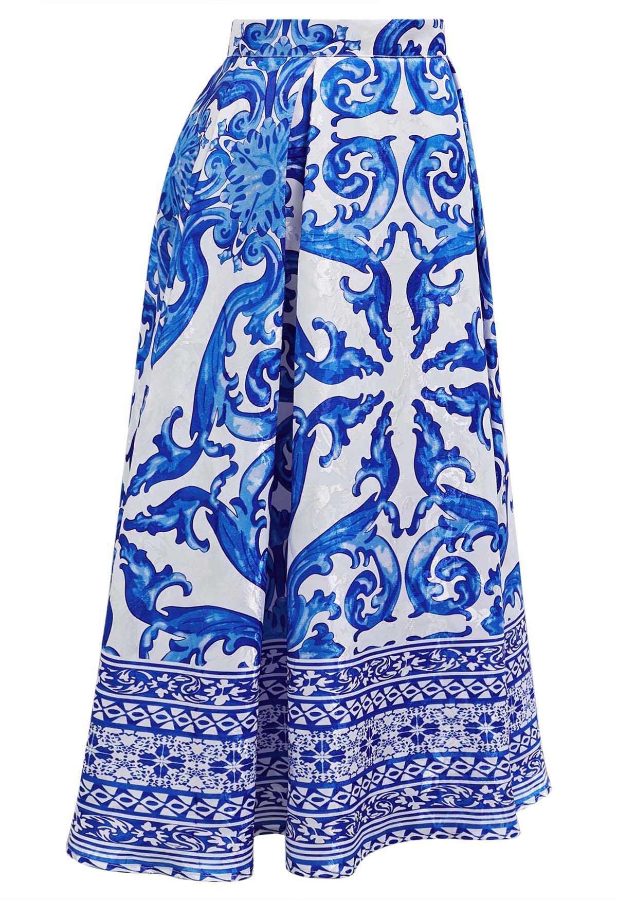 Falda midi plisada acampanada de jacquard azulejo azul