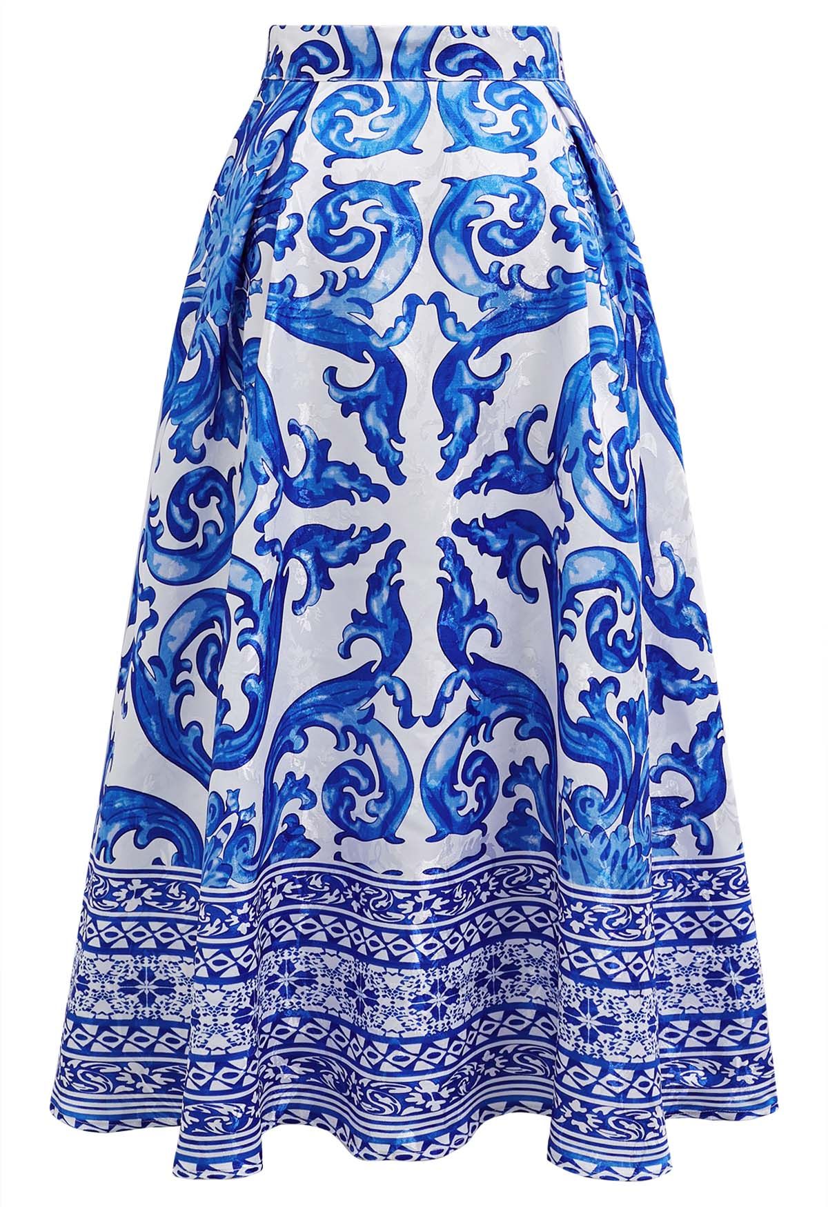 Falda midi plisada acampanada de jacquard azulejo azul