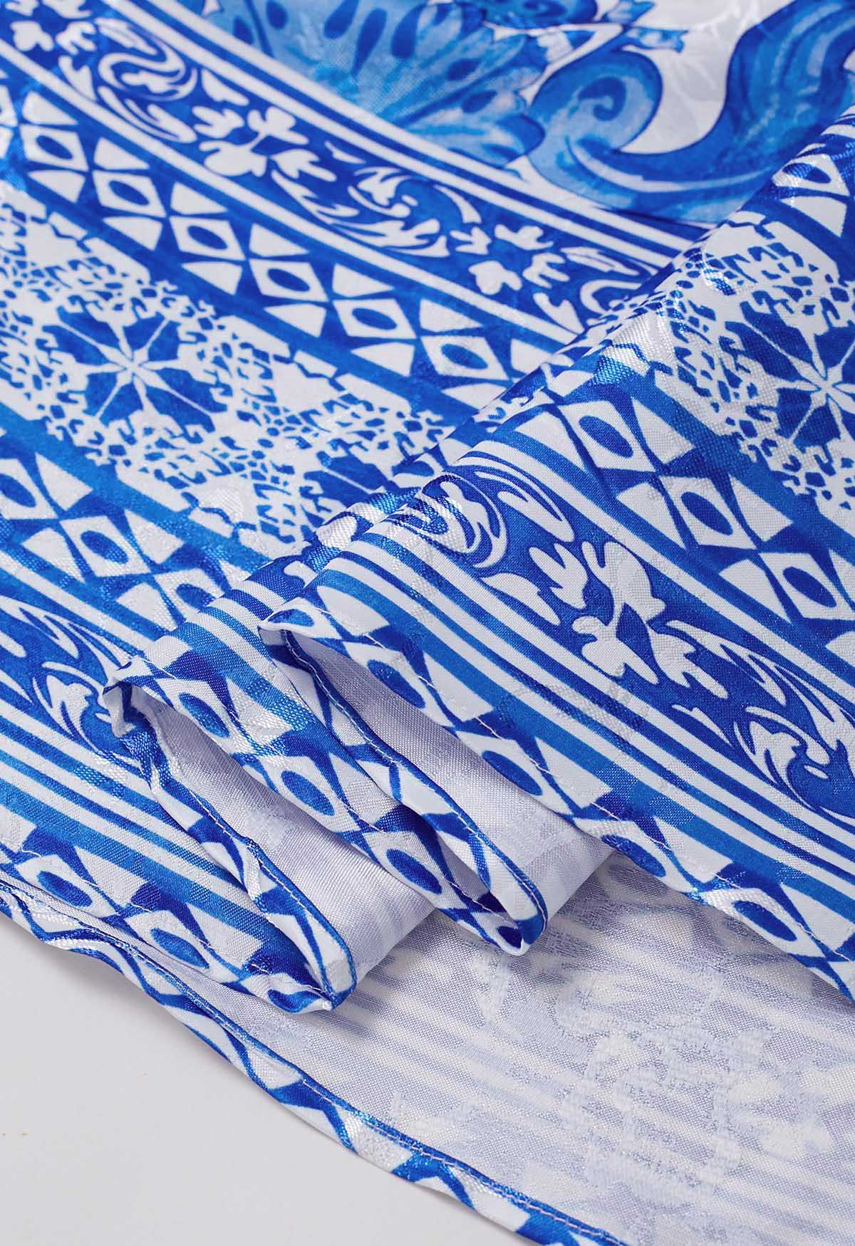 Falda midi plisada acampanada de jacquard azulejo azul