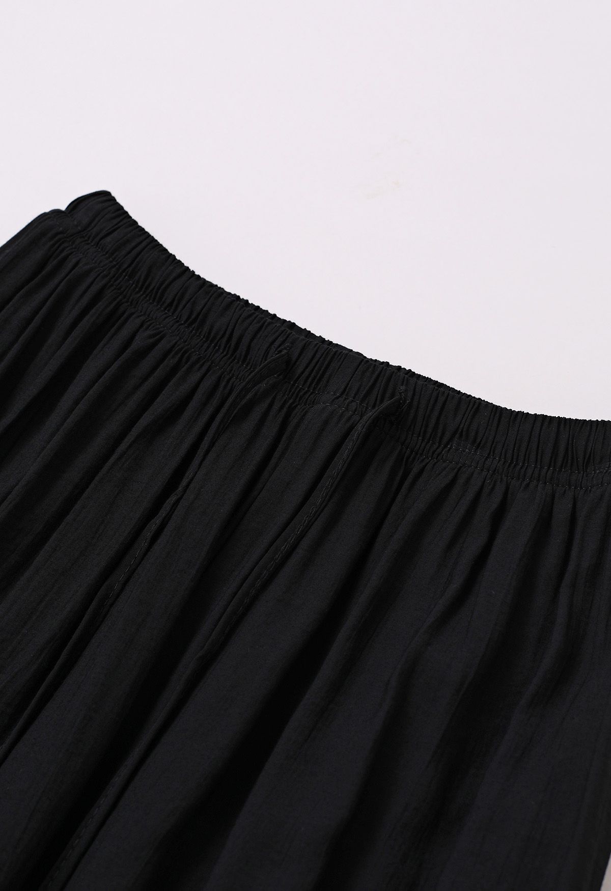 Pantalones ligeros de algodón con cordón en negro