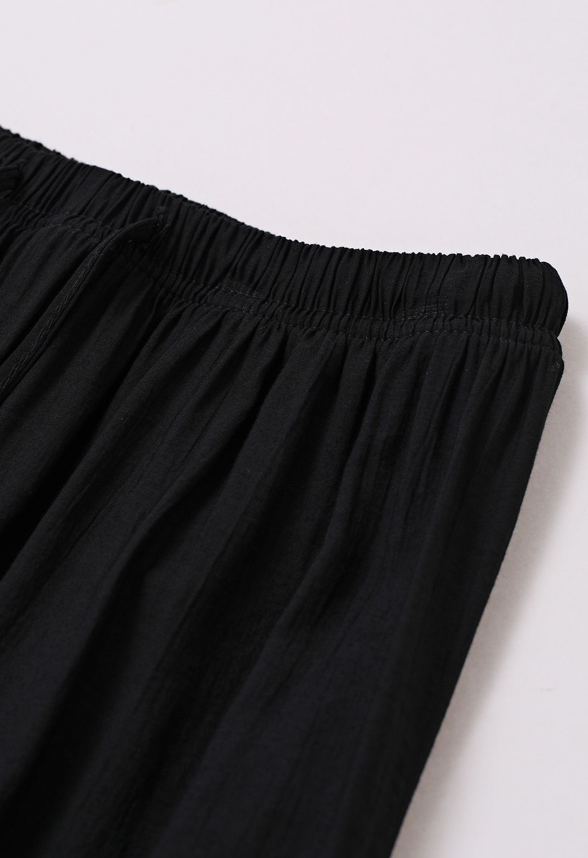 Pantalones ligeros de algodón con cordón en negro