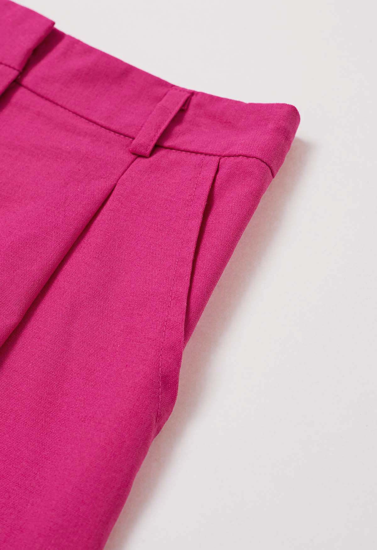 Pantalones cortos plisados en mezcla de lino con bolsillo lateral en rosa fuerte