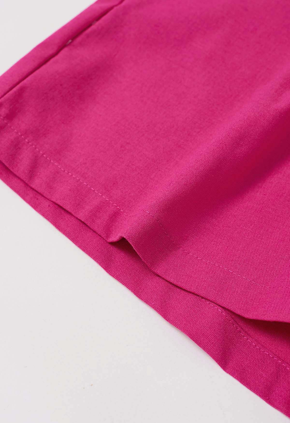 Pantalones cortos plisados en mezcla de lino con bolsillo lateral en rosa fuerte