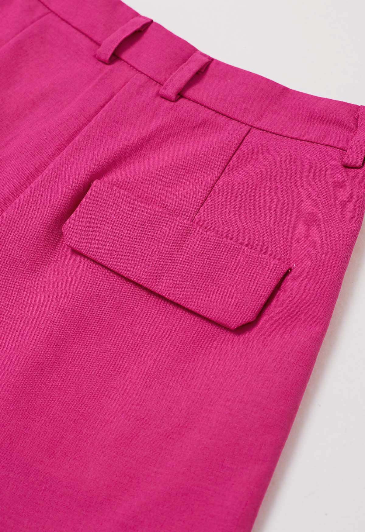 Pantalones cortos plisados en mezcla de lino con bolsillo lateral en rosa fuerte