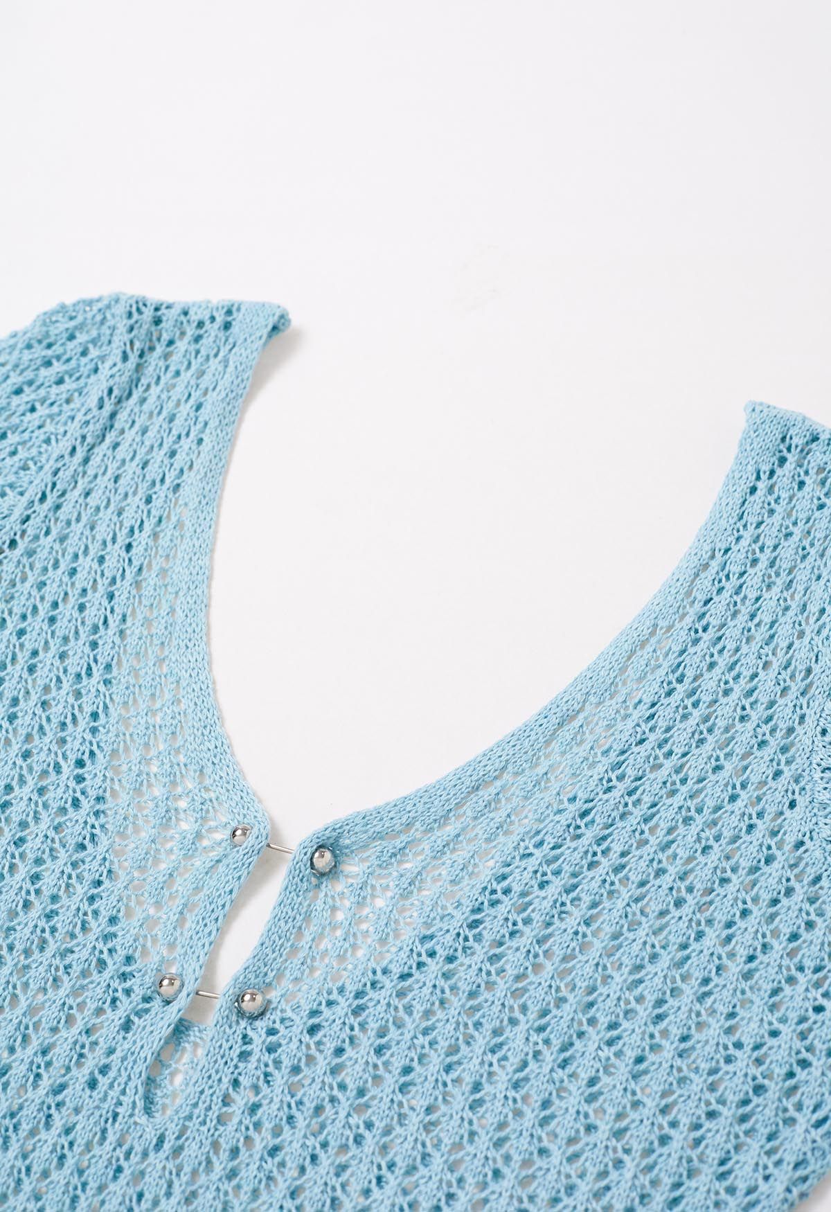 Pareo de crochet con decoración de cuentas y espalda abierta en azul