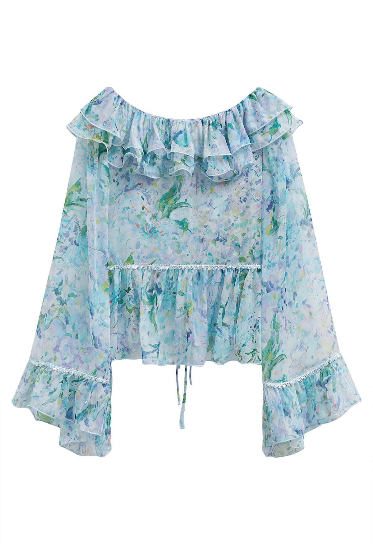 Top transparente con mangas acampanadas y volantes florales de acuarela en azul