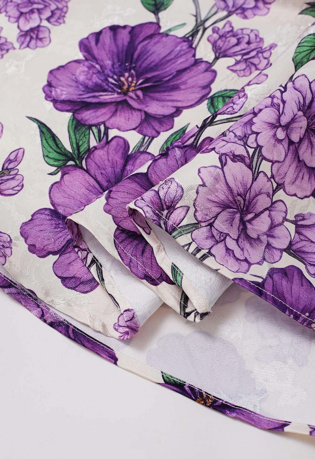 Falda acampanada plisada de jacquard con flores moradas