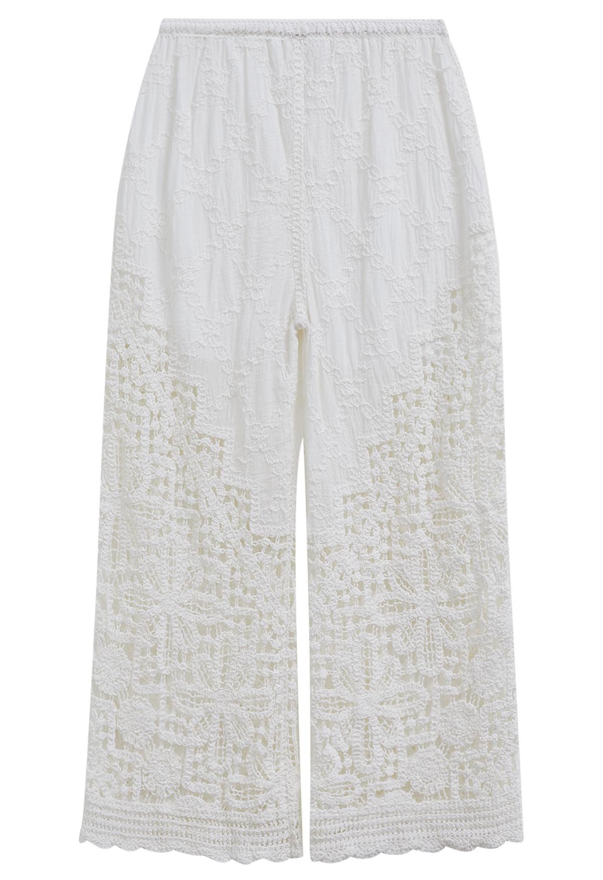 Pantalones de flores de crochet con puntada en forma de diamante en blanco