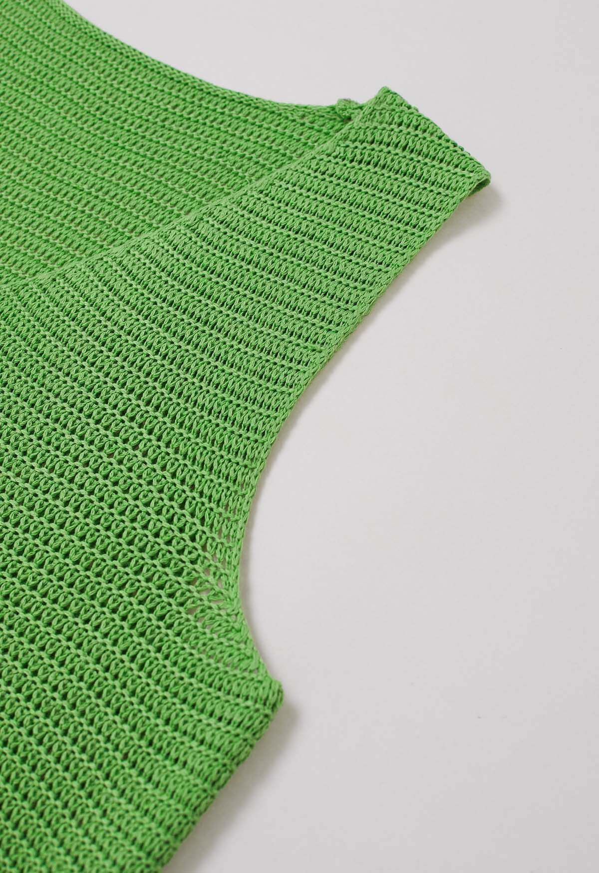 Conjunto de chaleco abotonado de crochet calado y falda con cordón en verde