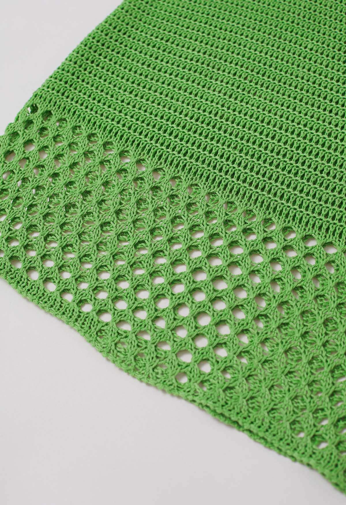 Conjunto de chaleco abotonado de crochet calado y falda con cordón en verde