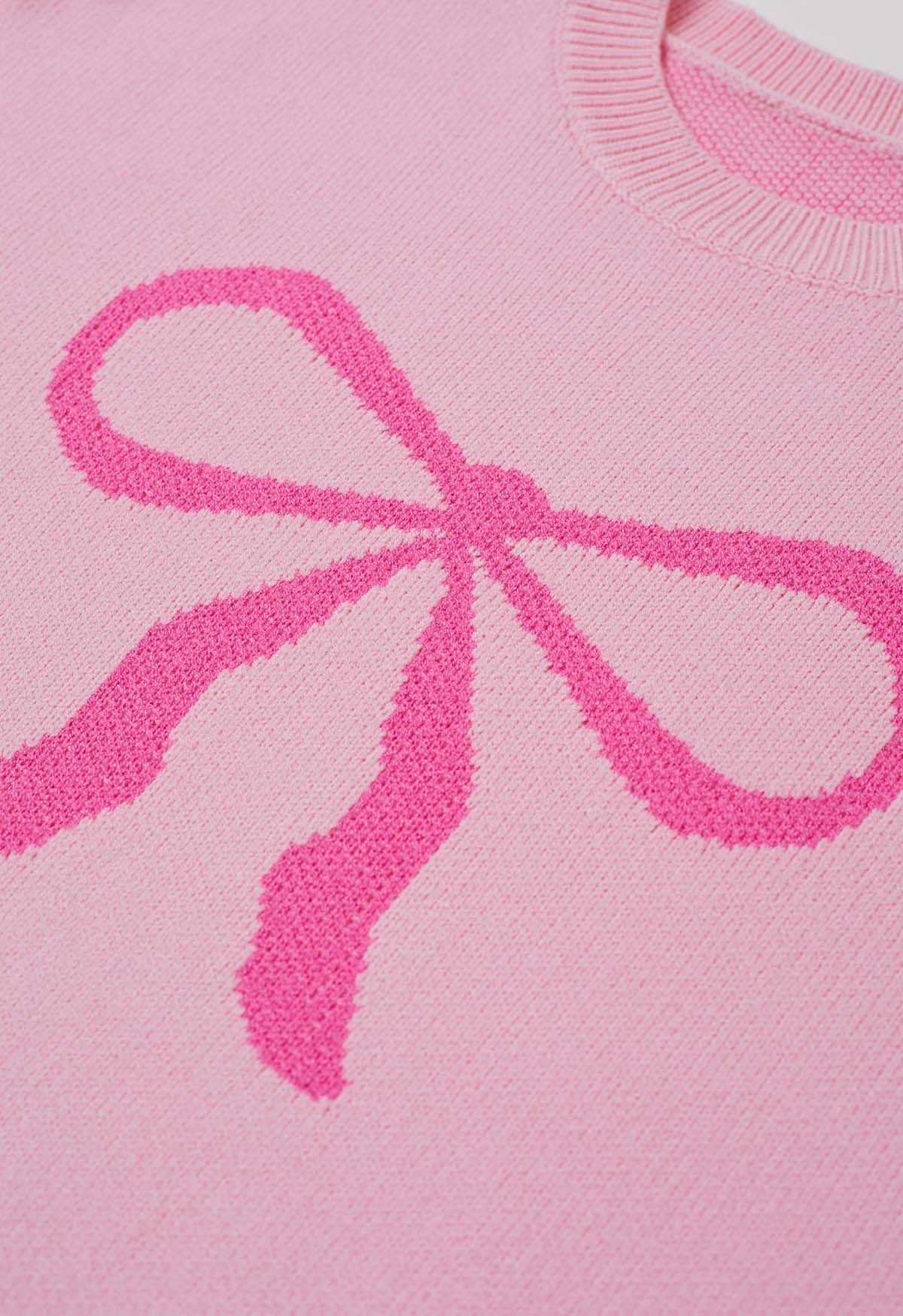 Suéter de punto jacquard con estampado de lazo y cinta en rosa