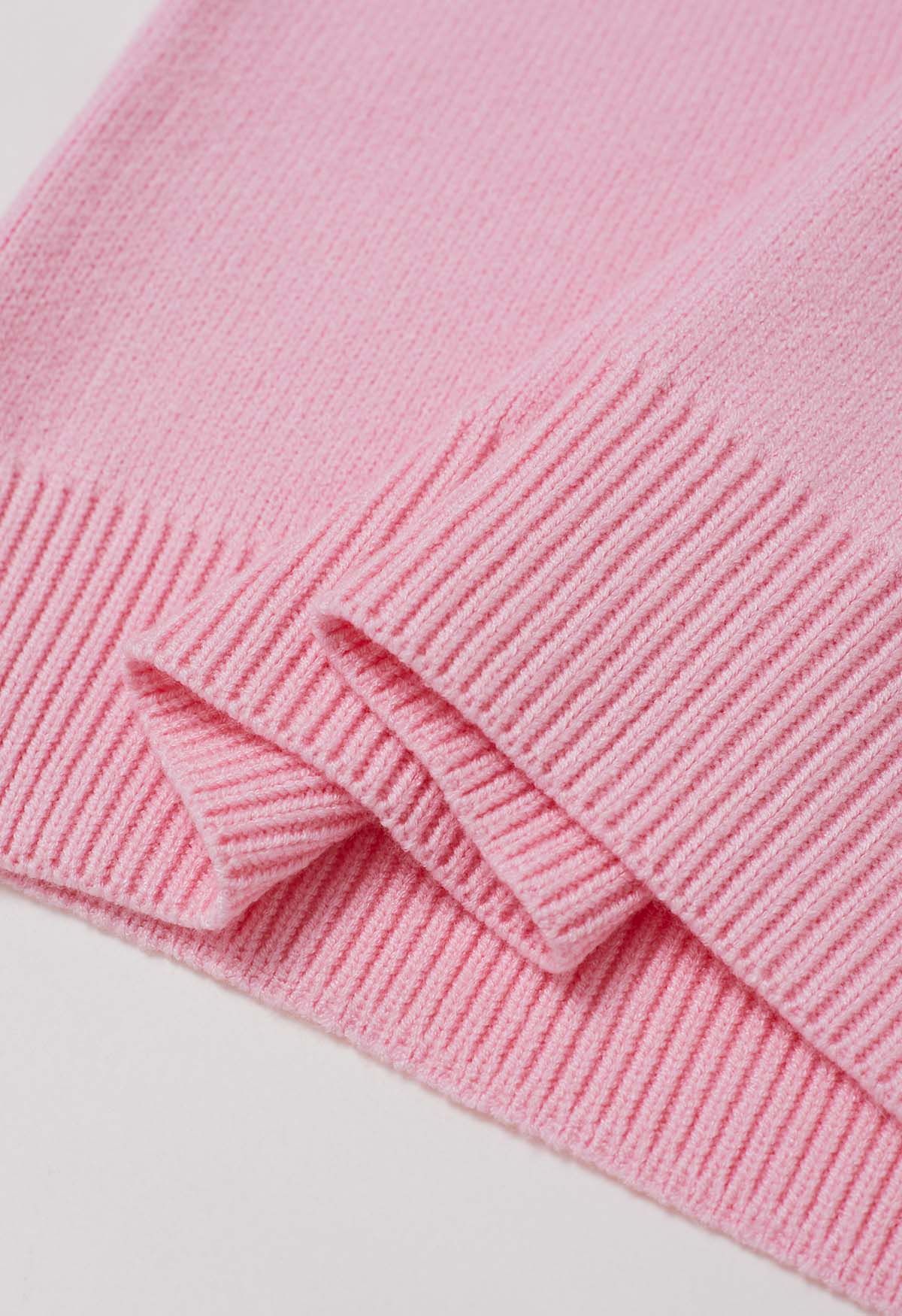 Suéter de punto jacquard con estampado de lazo y cinta en rosa