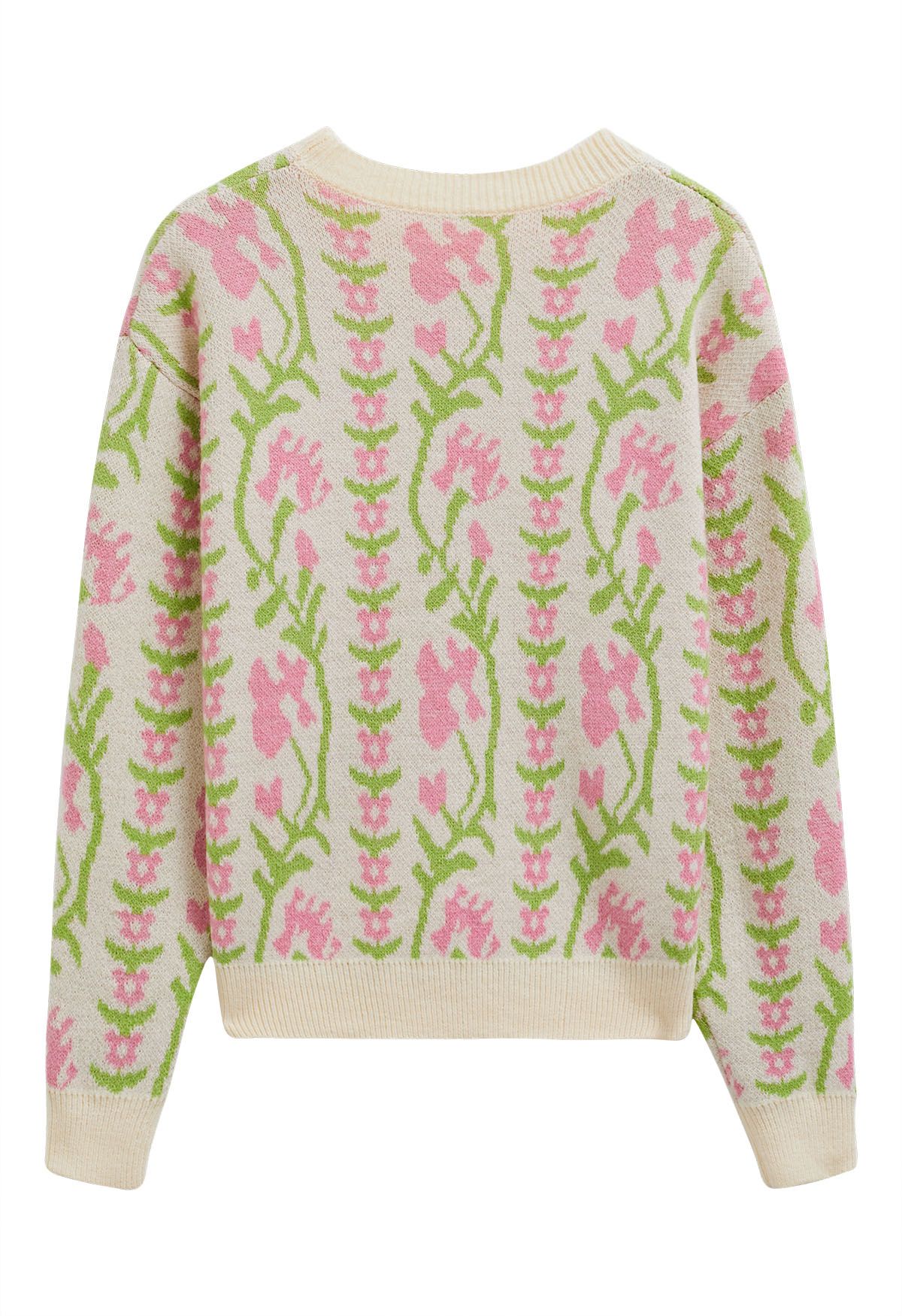 Jersey de punto jacquard con rama floral en color crema