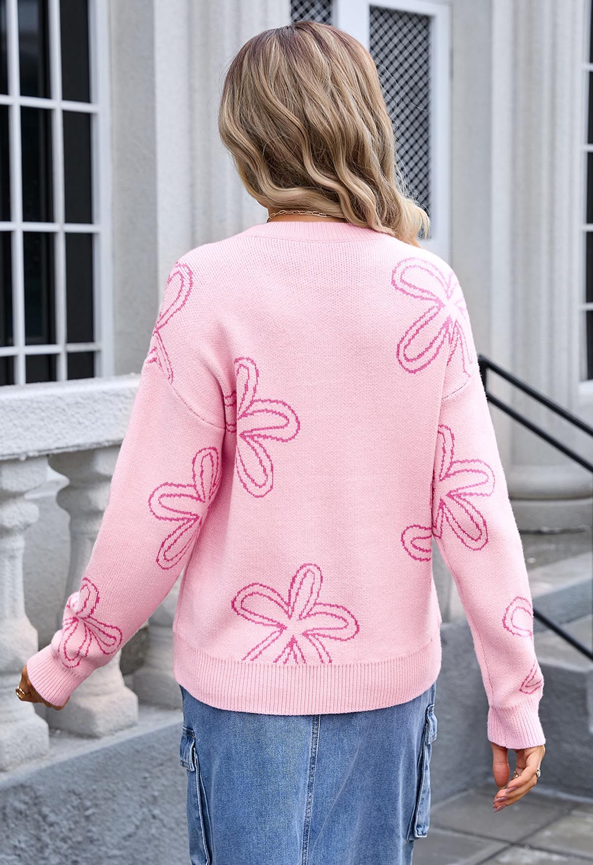 Suéter de punto jacquard con estampado floral en rosa