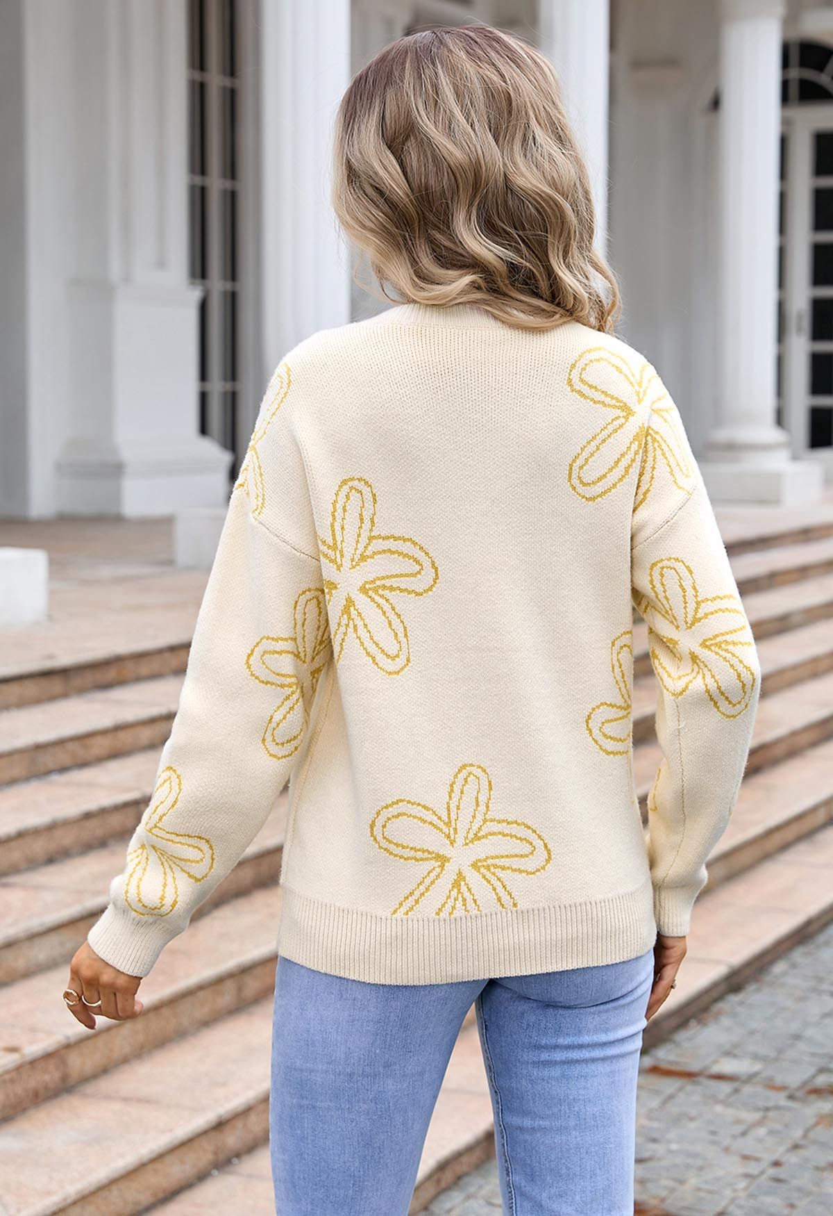 Suéter de punto jacquard con estampado floral en amarillo claro