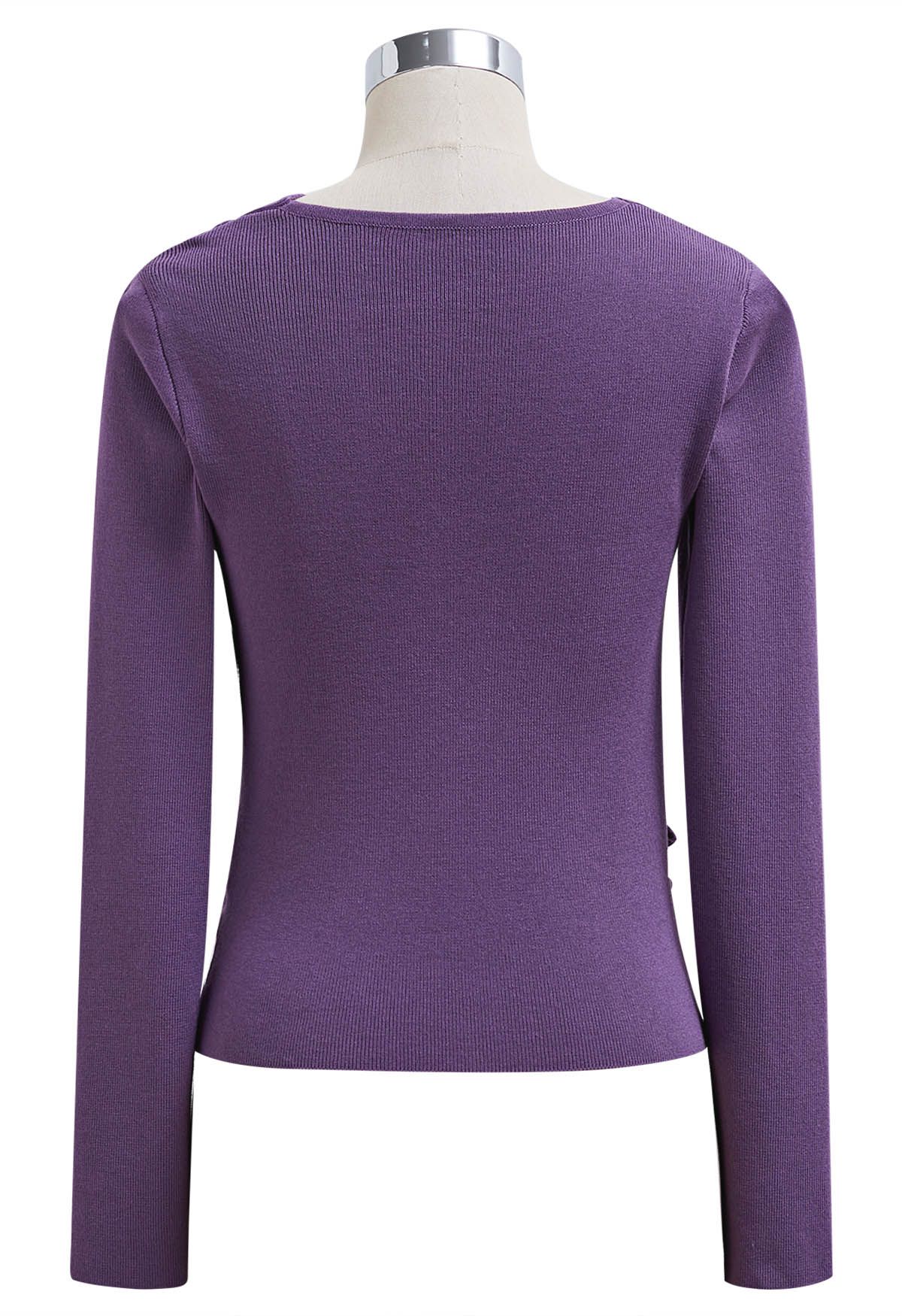 Blusa de punto con mangas largas fruncidas y nudo lateral en violeta