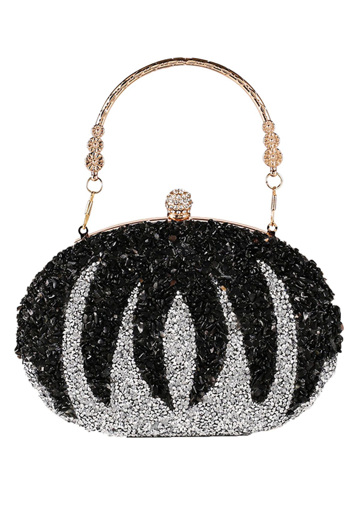 Clutch ovalado de calabaza con diamantes de imitación en negro