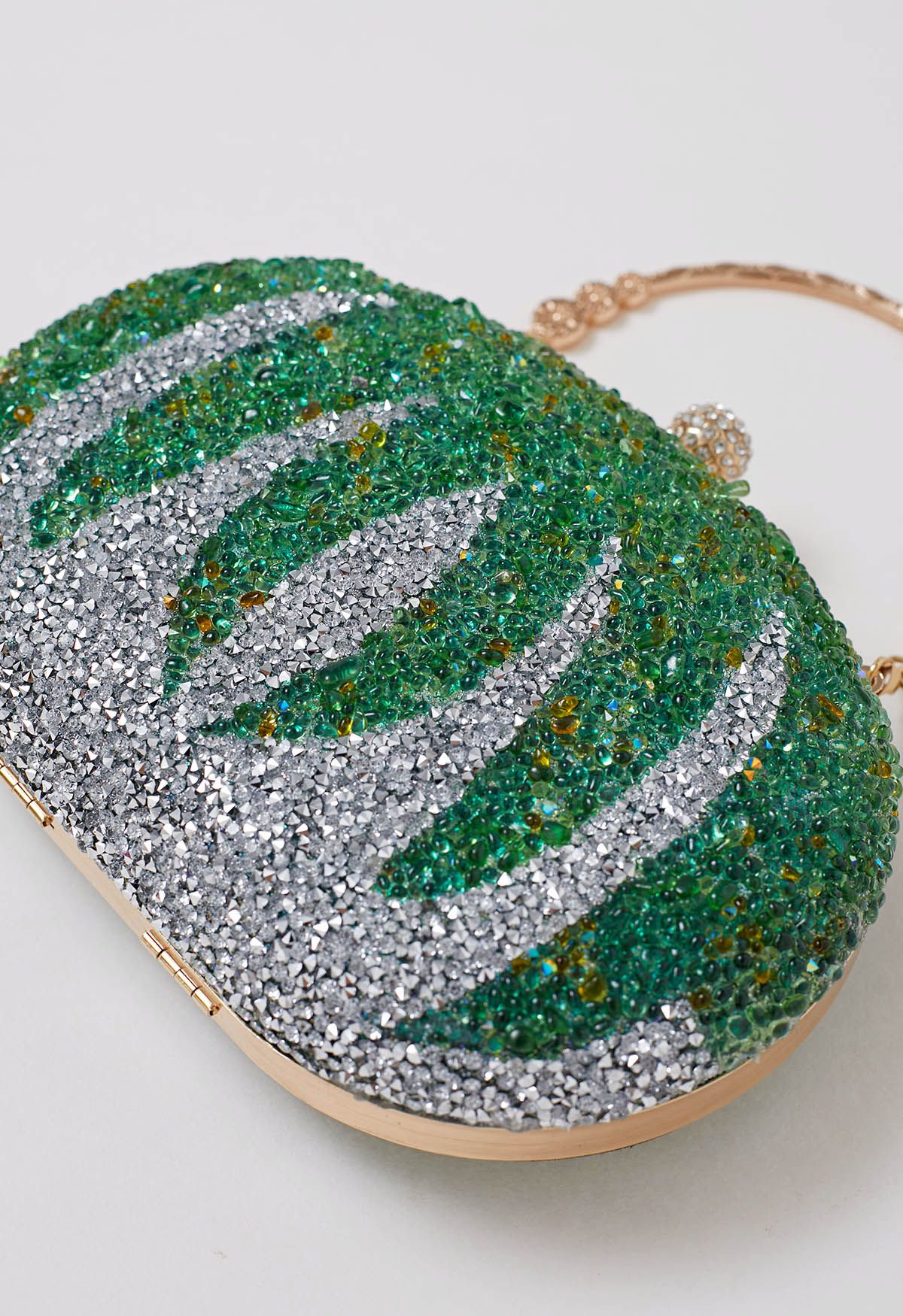 Clutch ovalado de calabaza con diamantes de imitación en verde