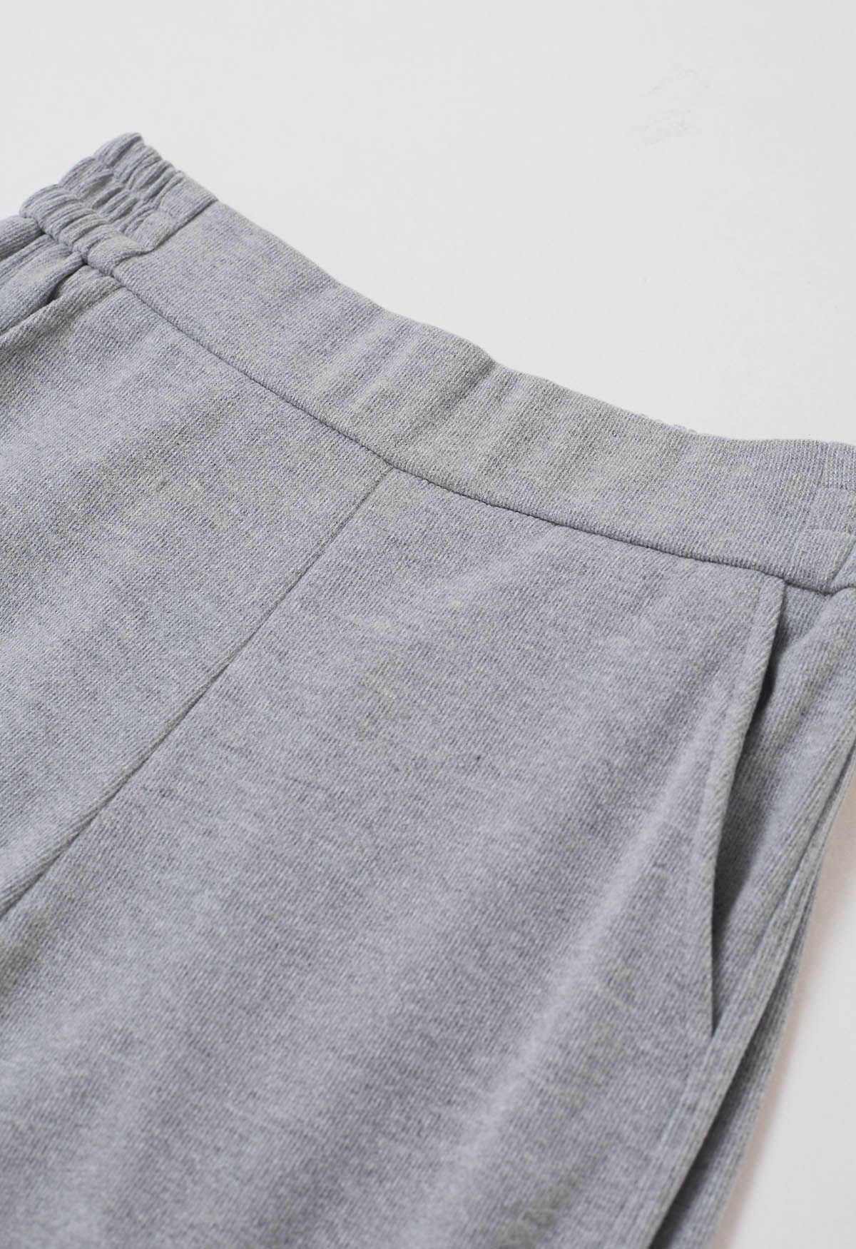 Pantalones acampanados Graceful Ease en color gris