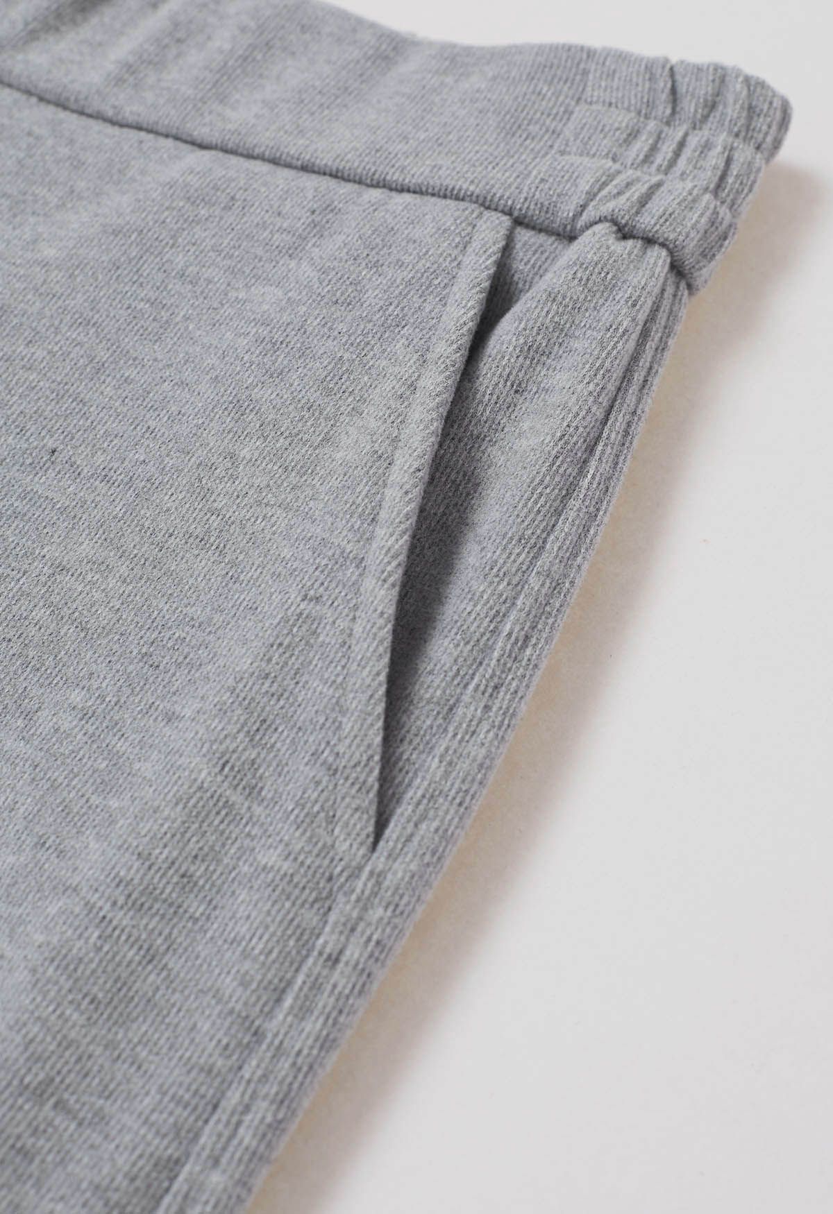 Pantalones acampanados Graceful Ease en color gris