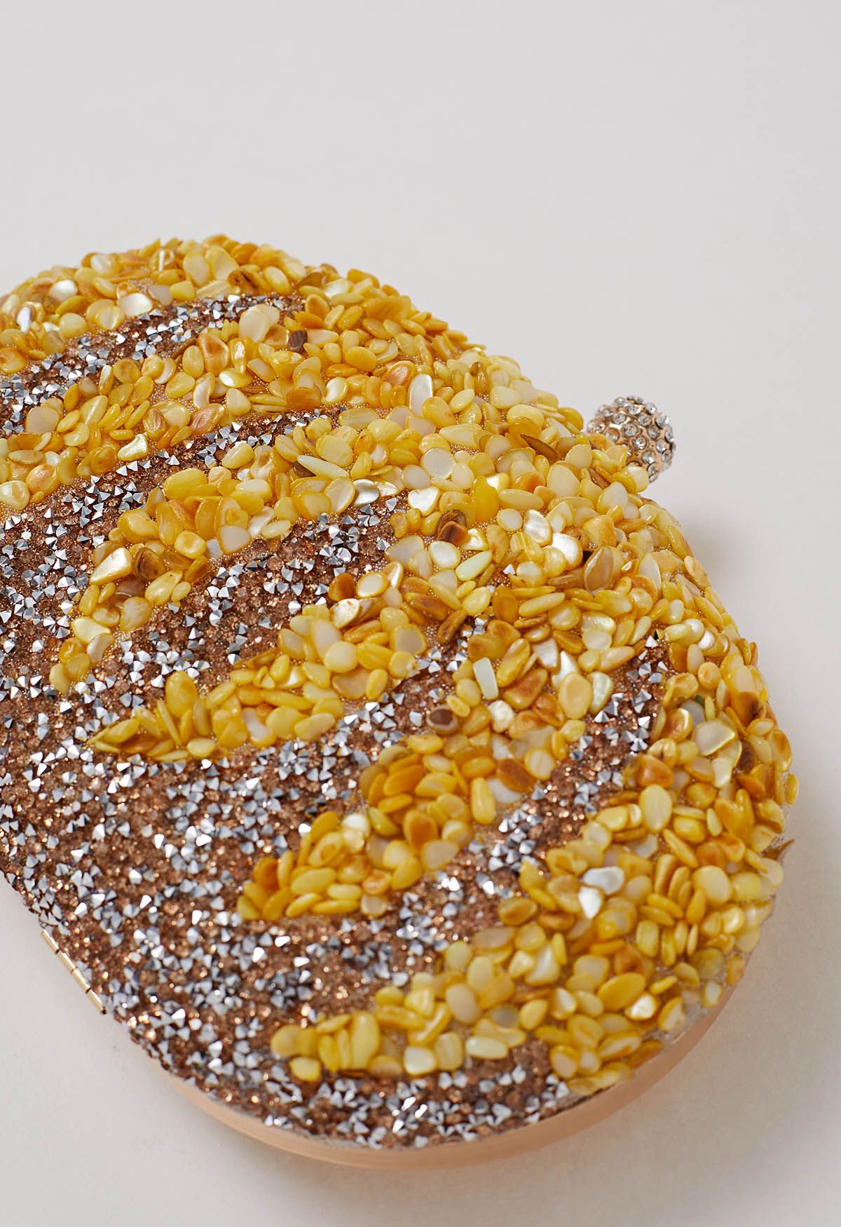 Clutch ovalado de calabaza con diamantes de imitación en amarillo