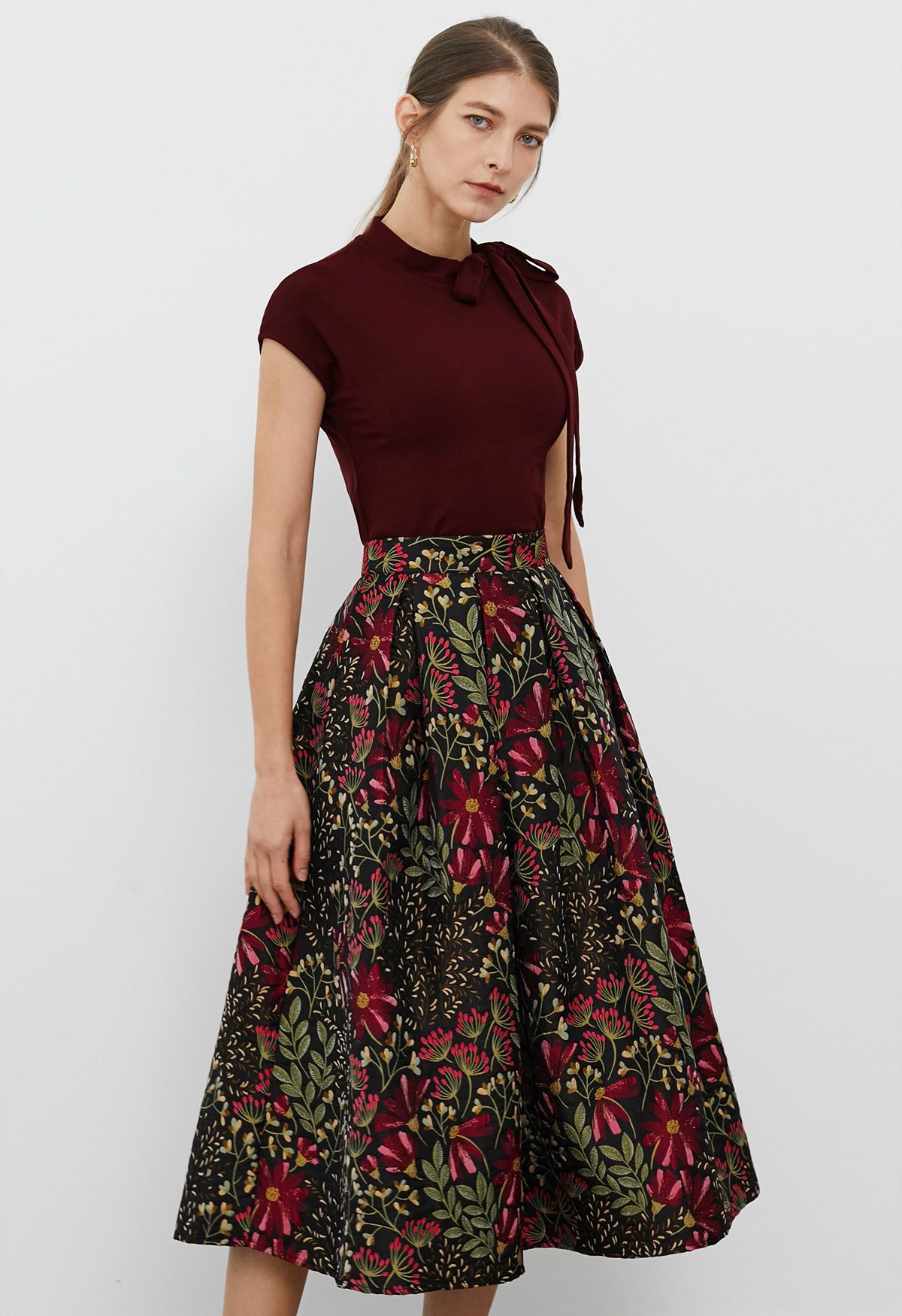 Falda midi plisada con estampado de margaritas en jacquard en color negro